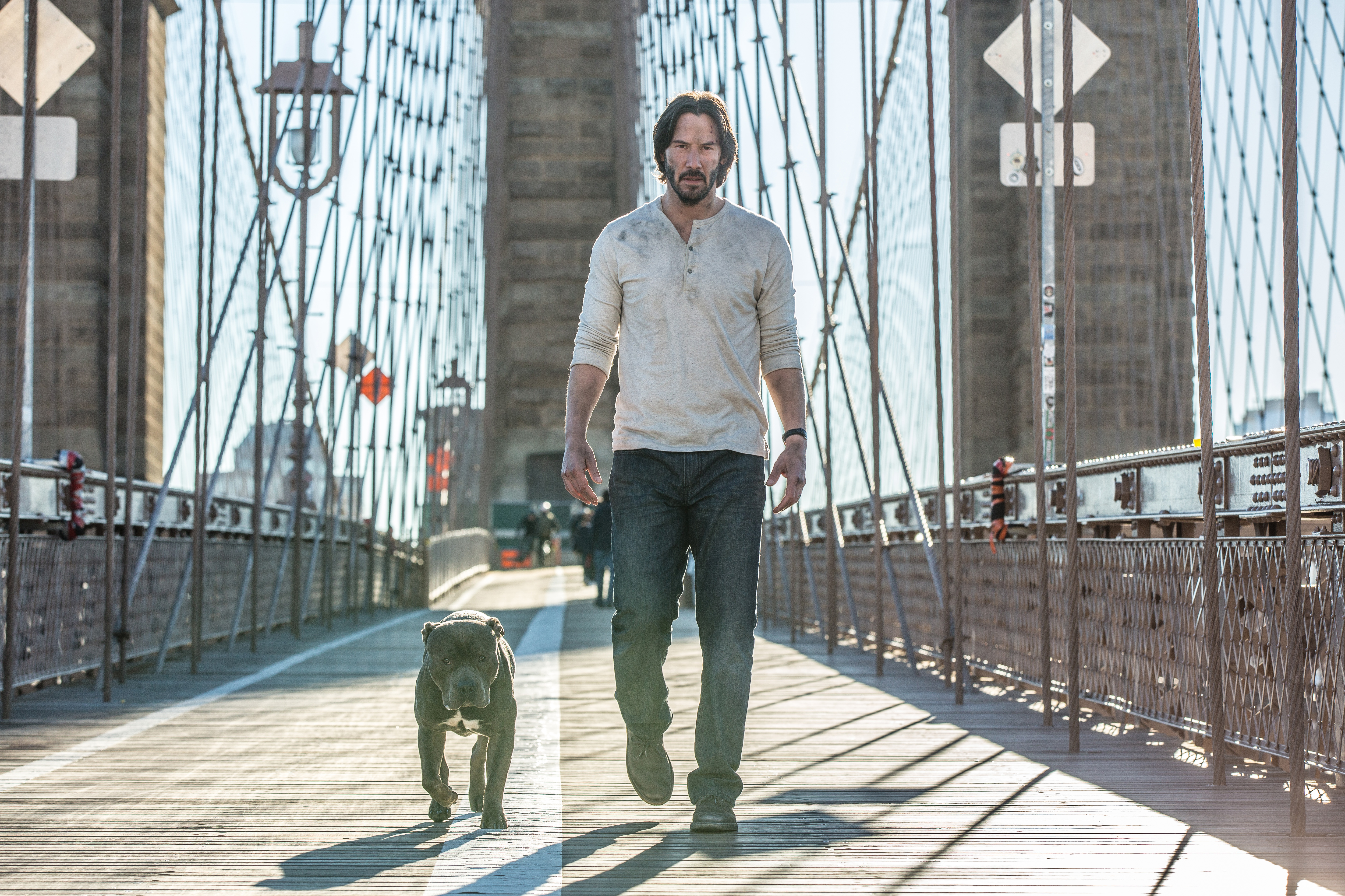 Keanu Reeves and dog on Brooklyn Bridge HD Wallpaper