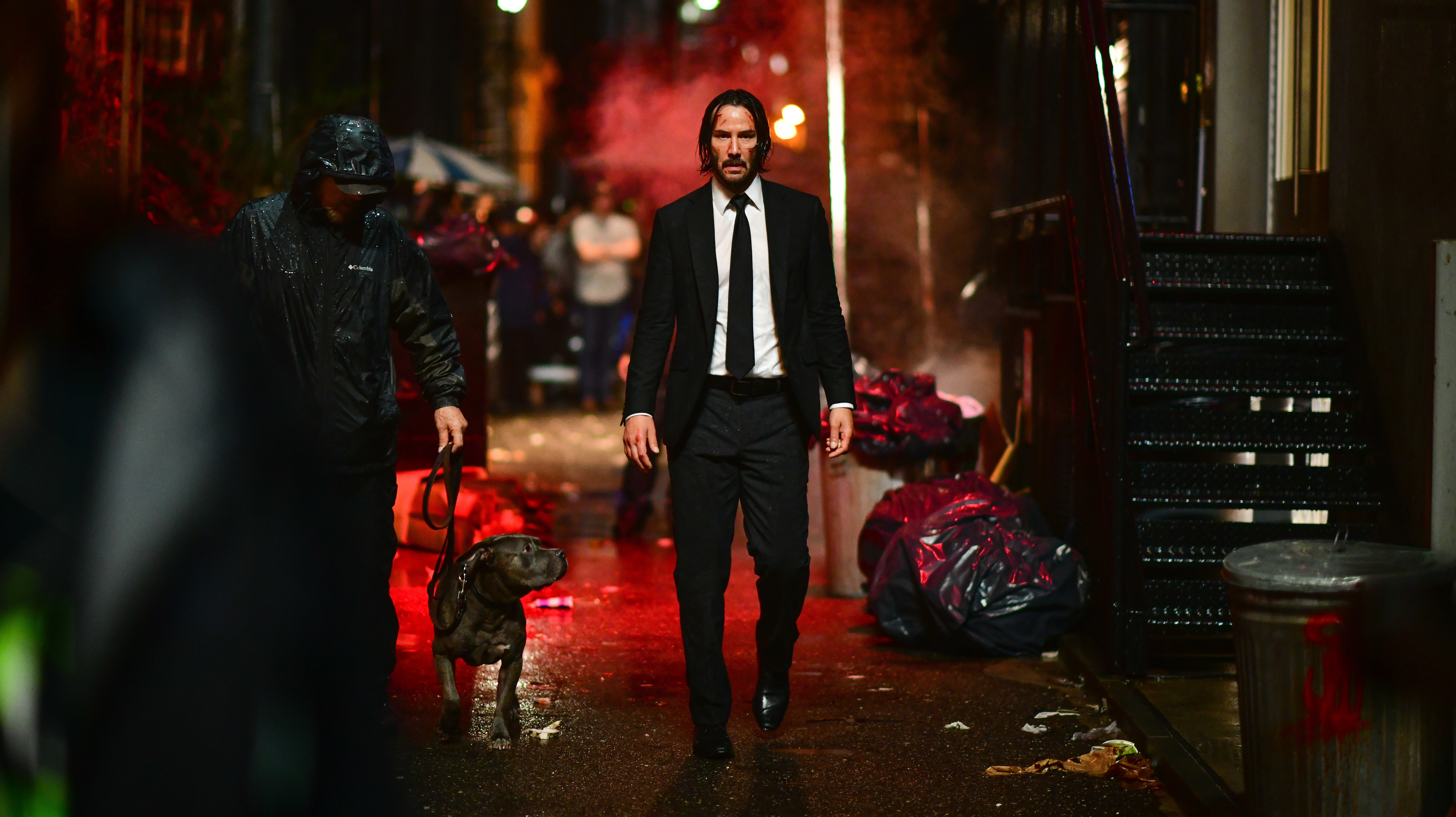 Keanu Reeves with dog in alley HD Wallpaper
