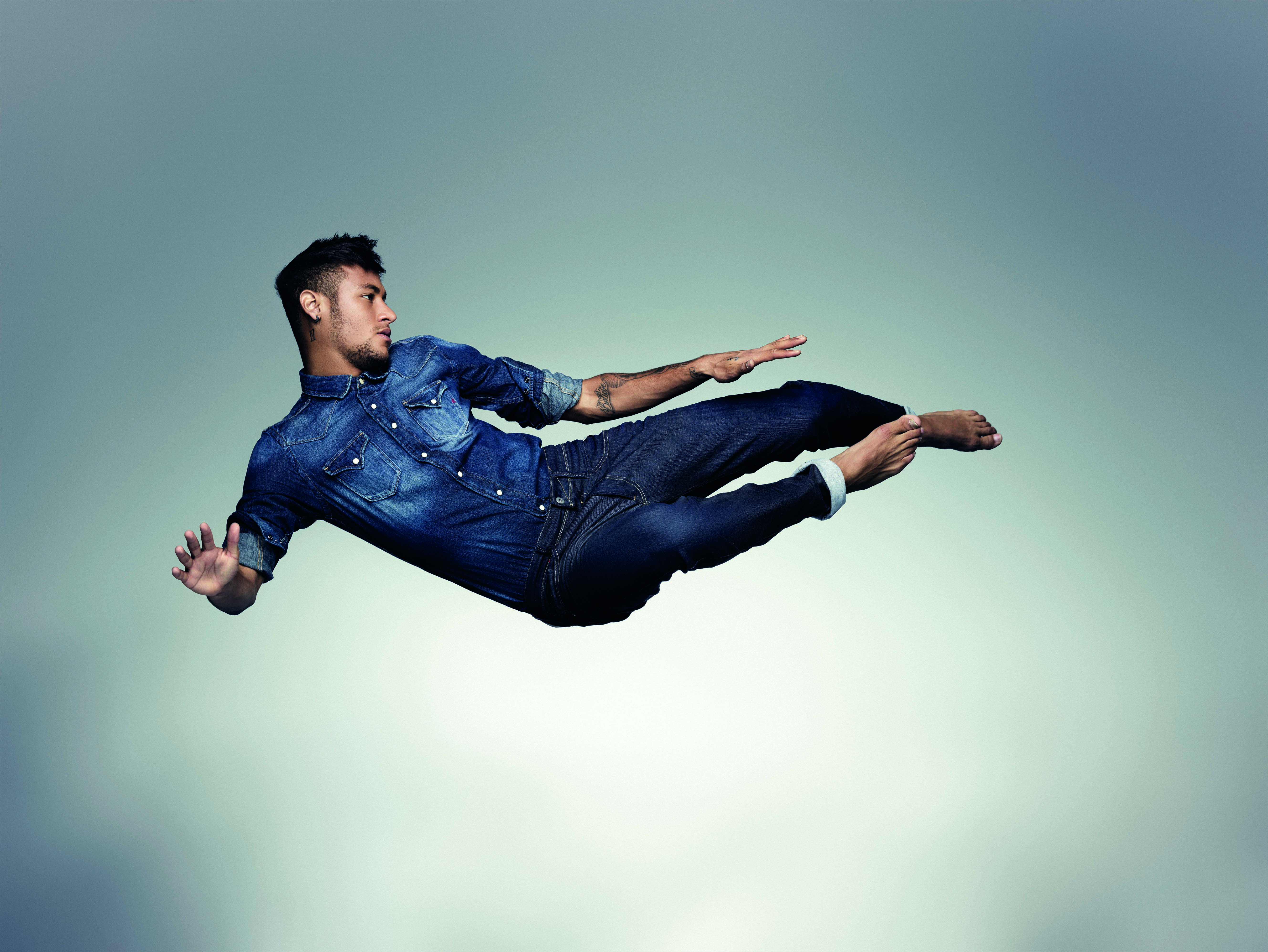 Neymar Jr. in mid-air HD Wallpaper