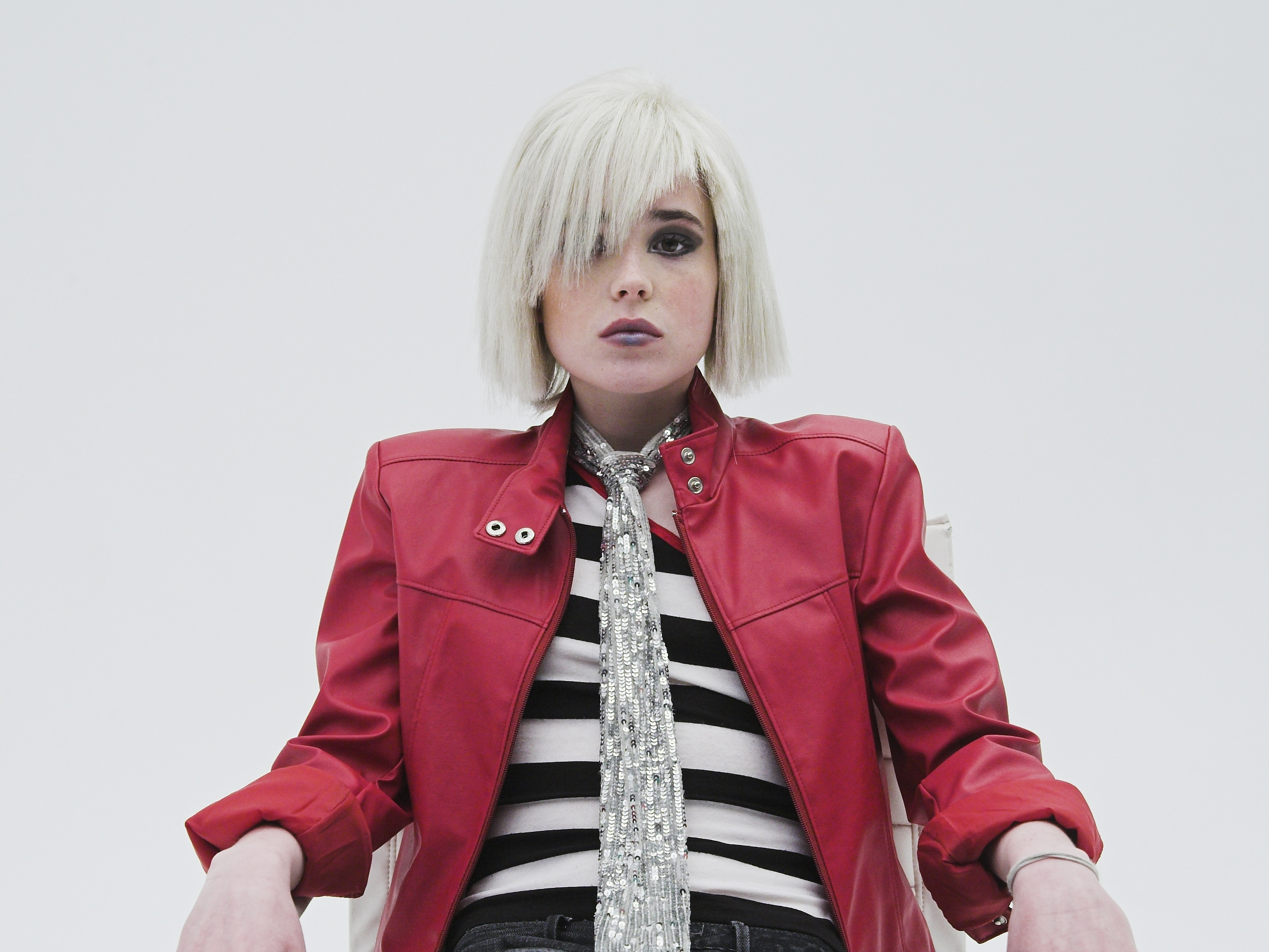 Ellen Page in red jacket and striped shirt HD Wallpaper
