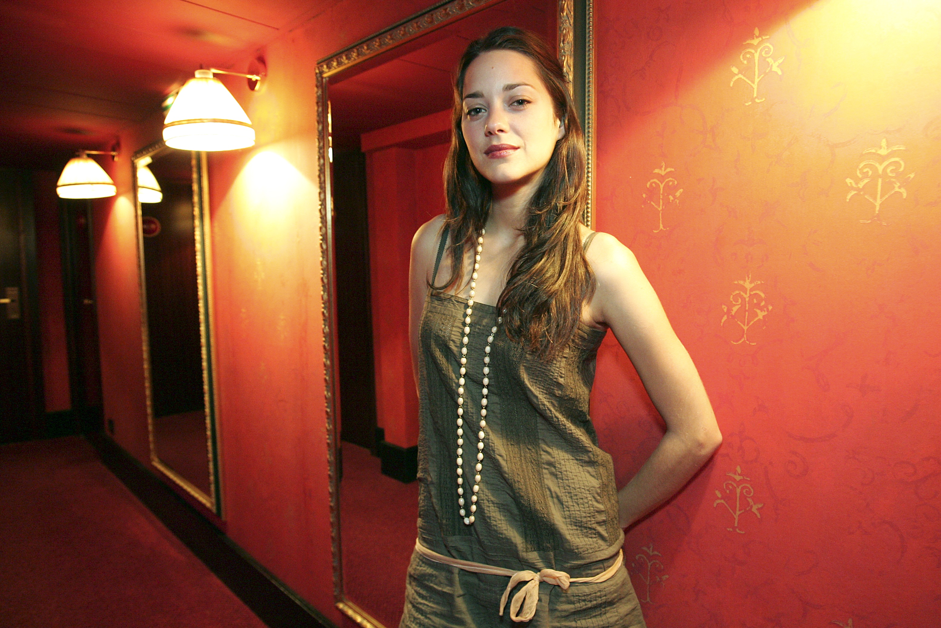 Marion Cotillard in a hallway HD Wallpaper