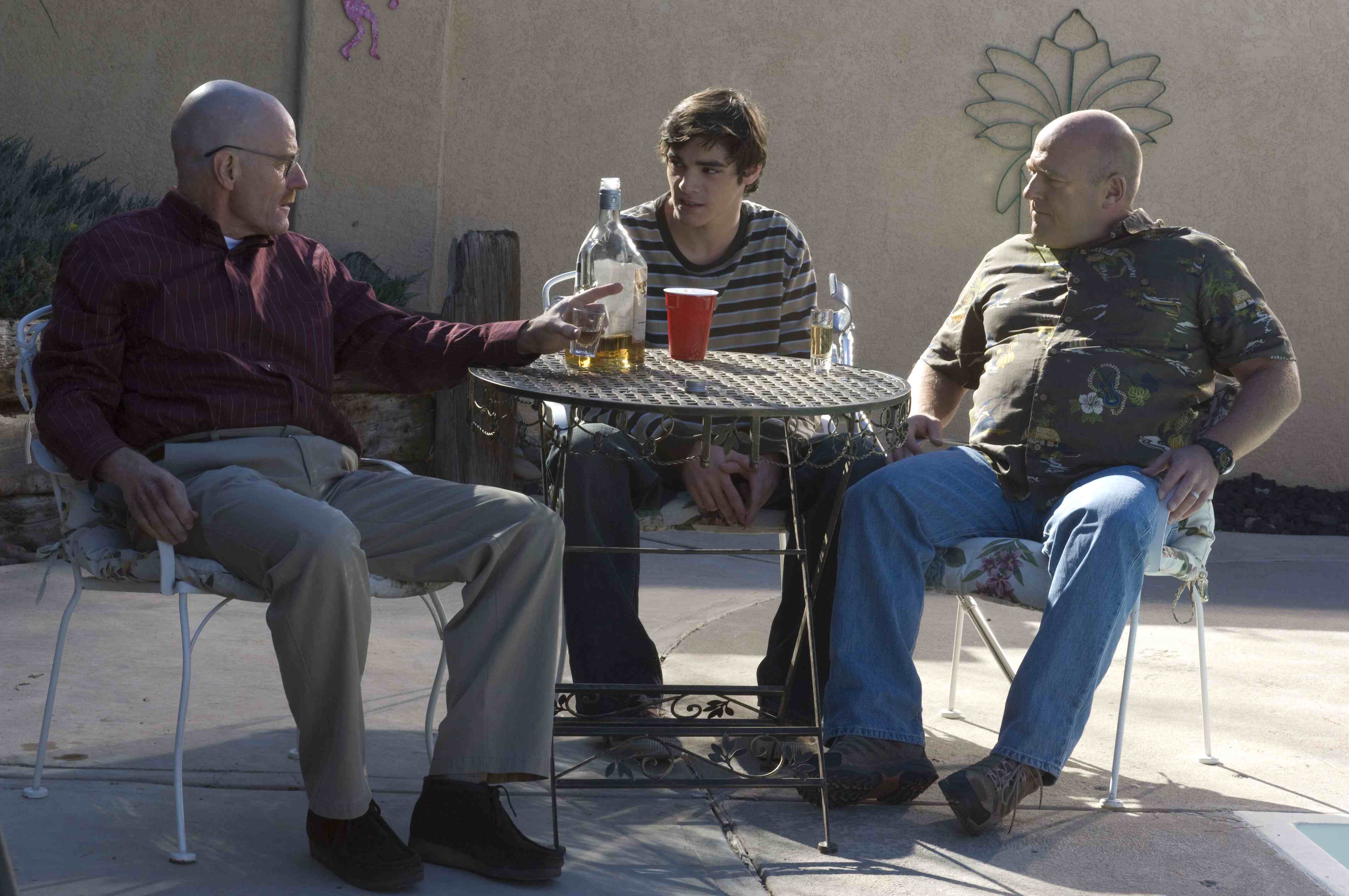 Bryan Cranston and two men at a table HD Wallpaper