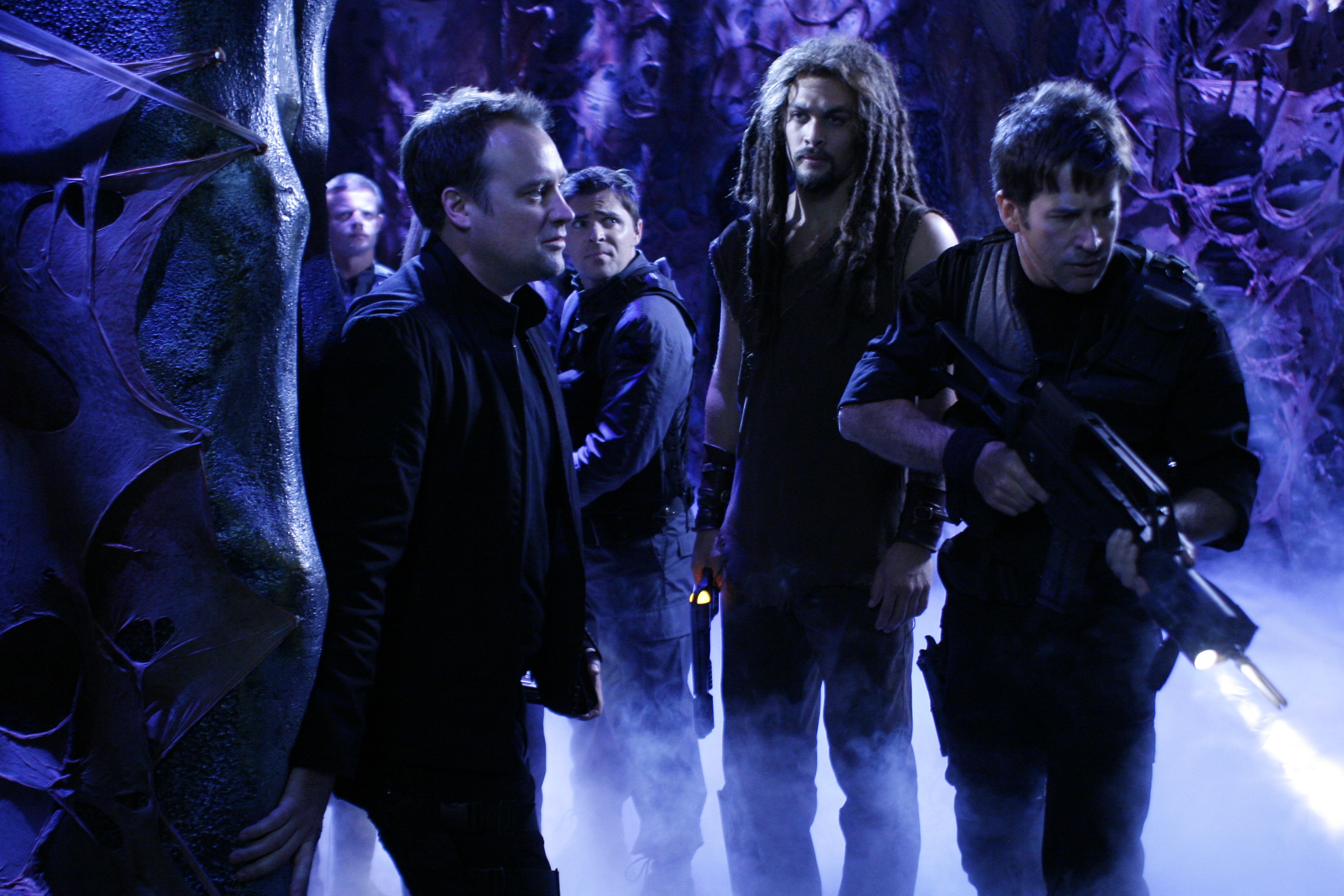 Jason Momoa and soldiers in a cave HD Wallpaper