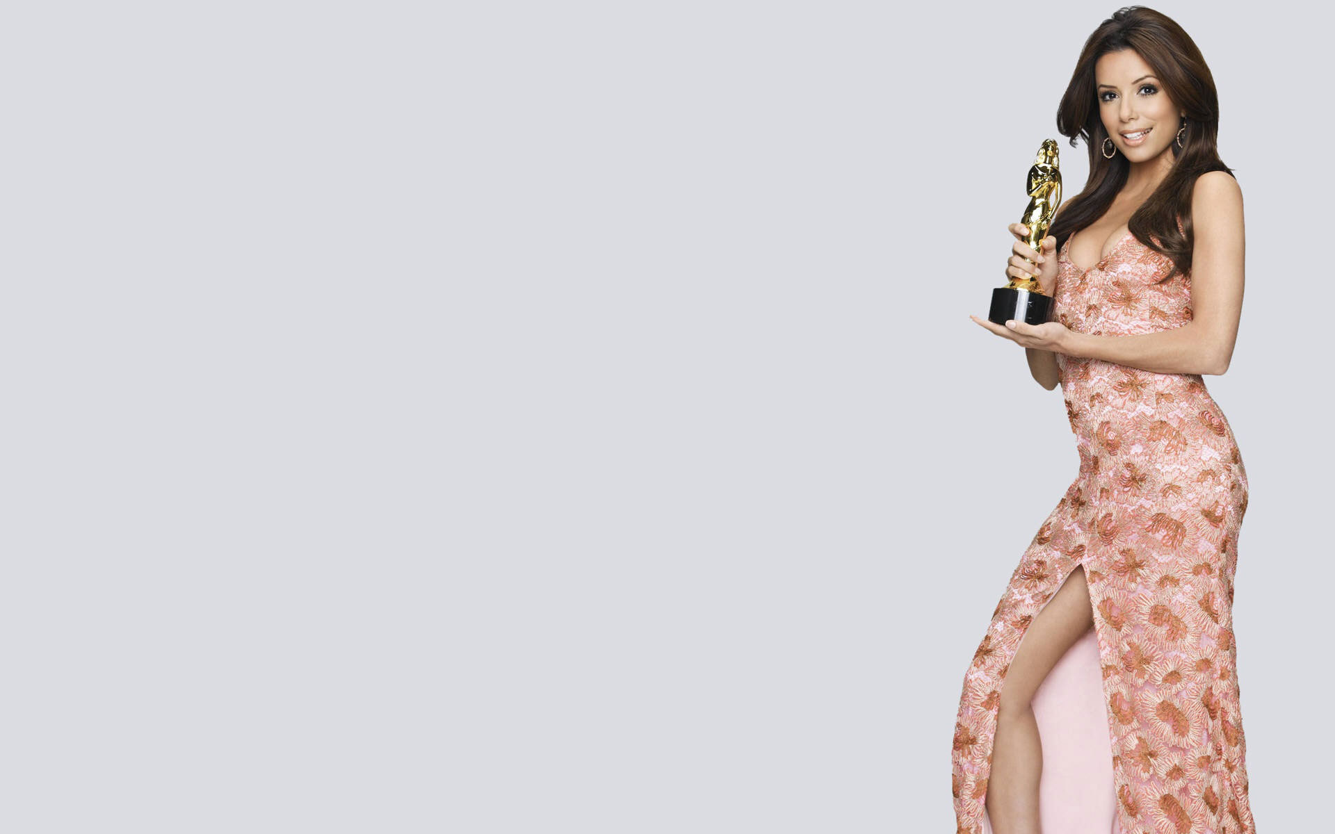 Eva Longoria holding an award HD Wallpaper
