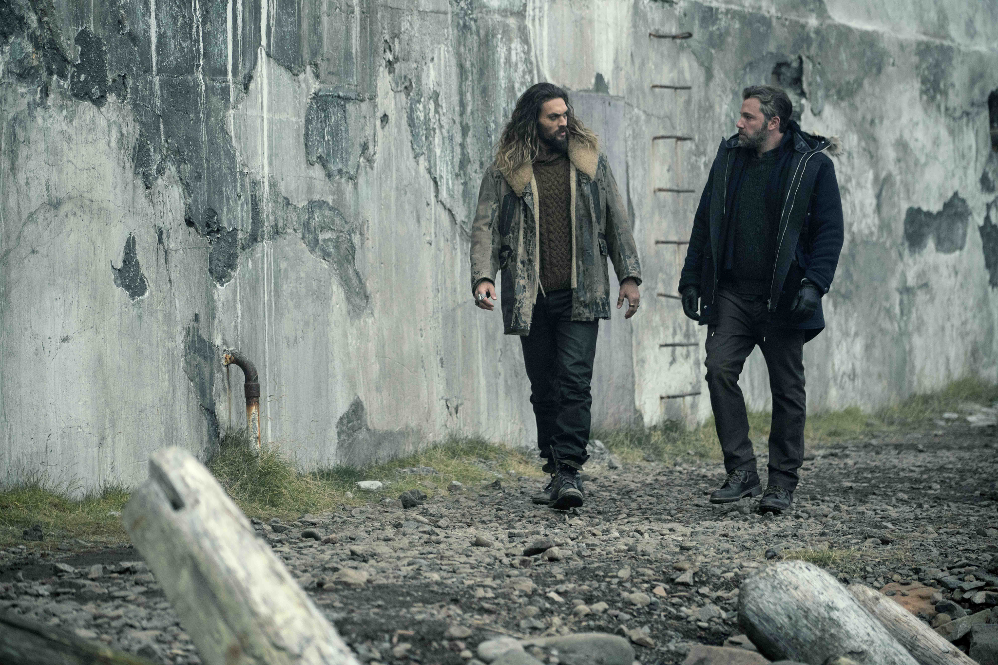 Jason Momoa and Ben Affleck walking by a concrete wall HD Wallpaper