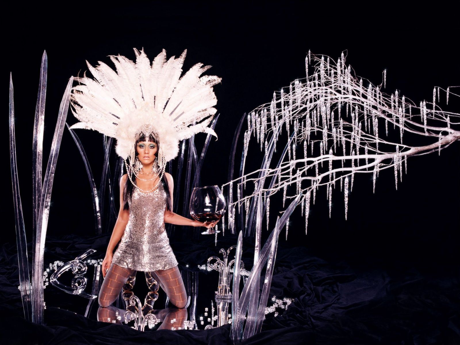 Christina Aguilera in a glamorous, icy setting HD Wallpaper