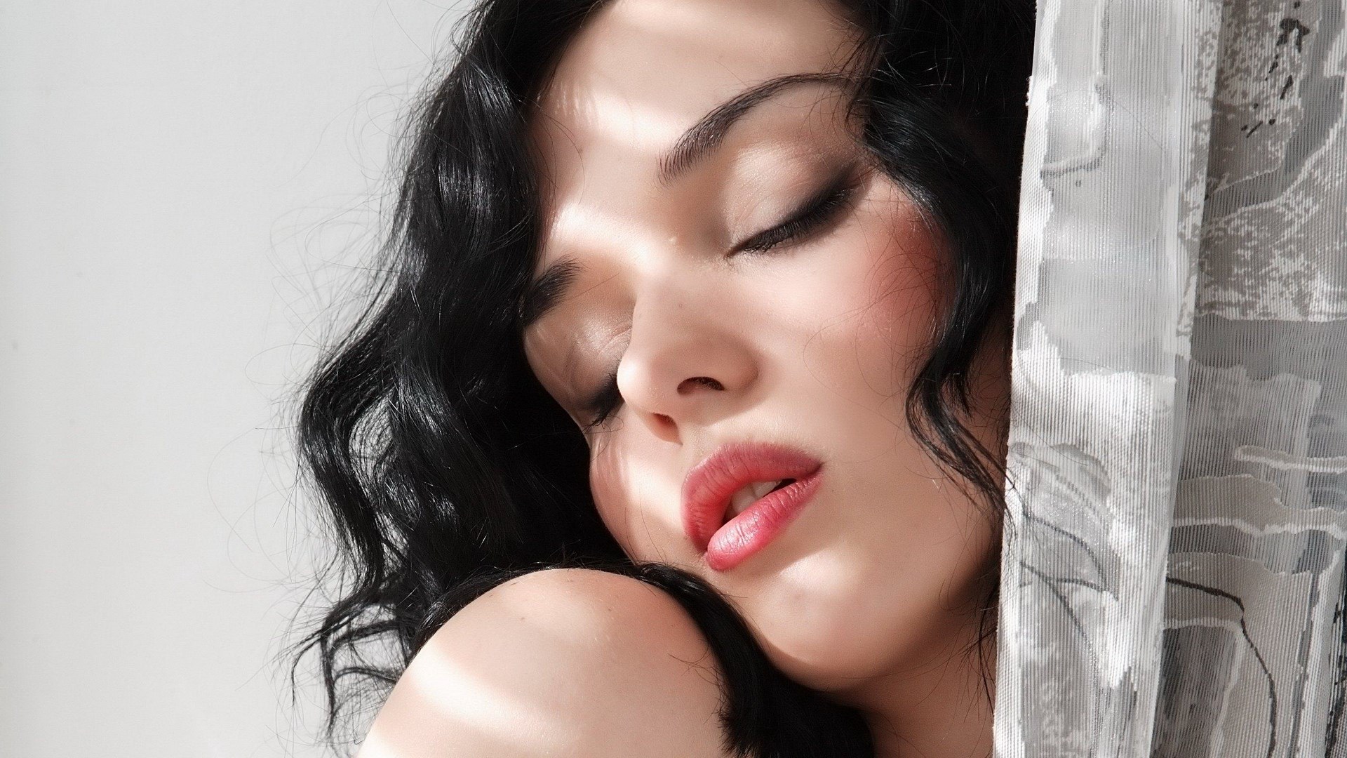 Woman with dark hair and makeup HD Wallpaper