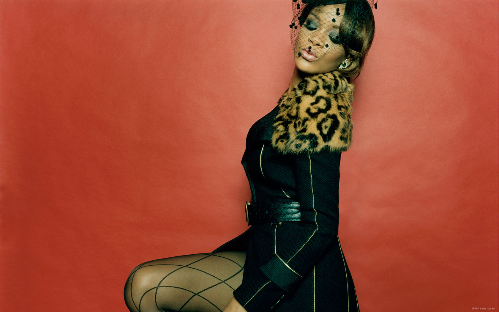 Rihanna wearing a leopard print collar and veil HD Wallpaper