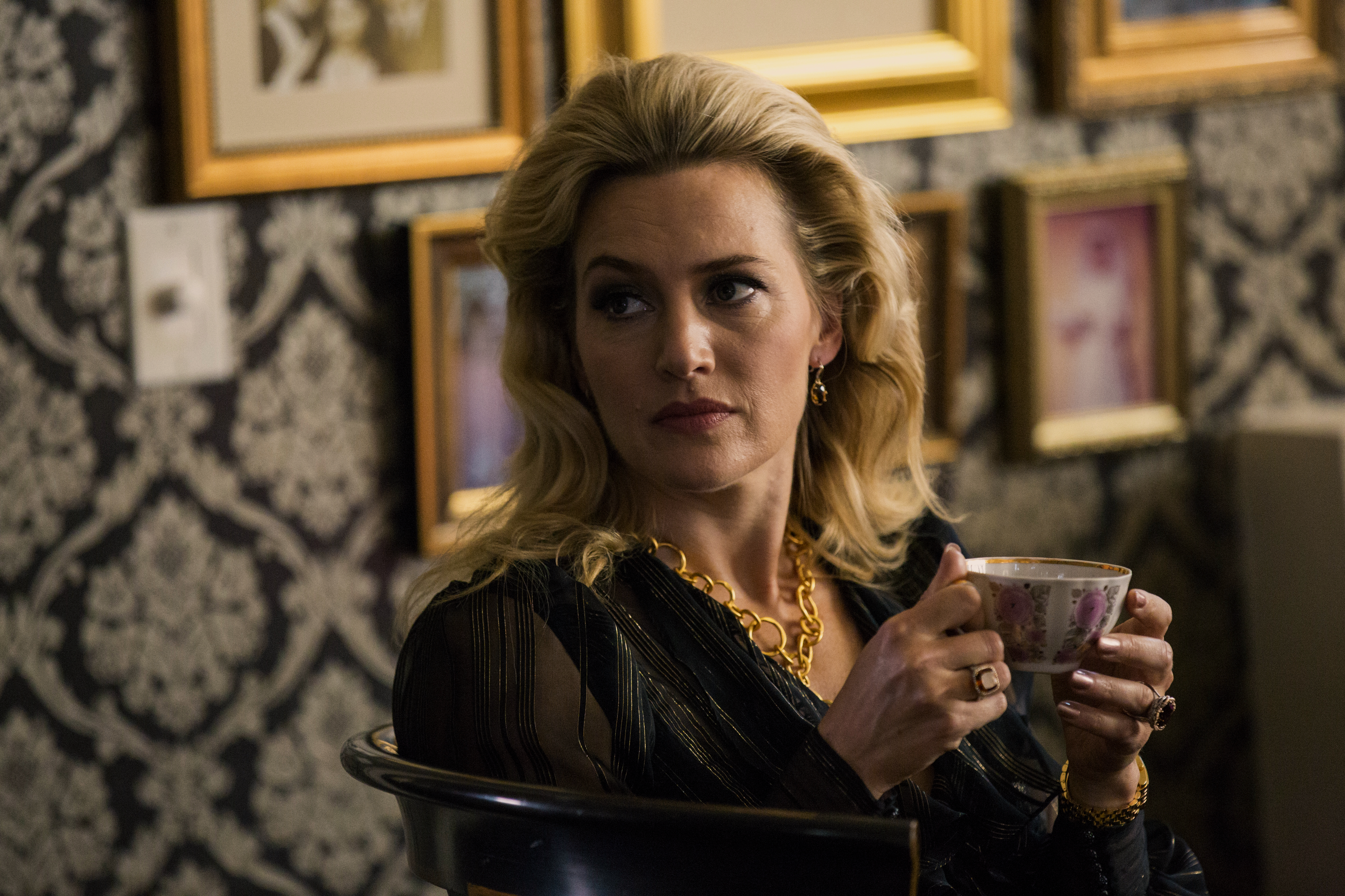 Kate Winslet holding a teacup HD Wallpaper