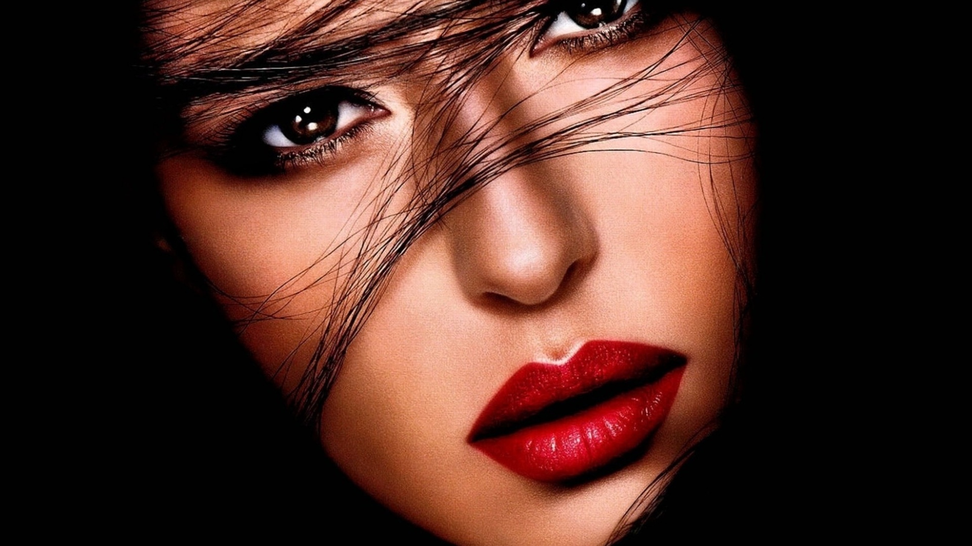 Monica Bellucci with Red Lips and Flowing Hair HD Wallpaper