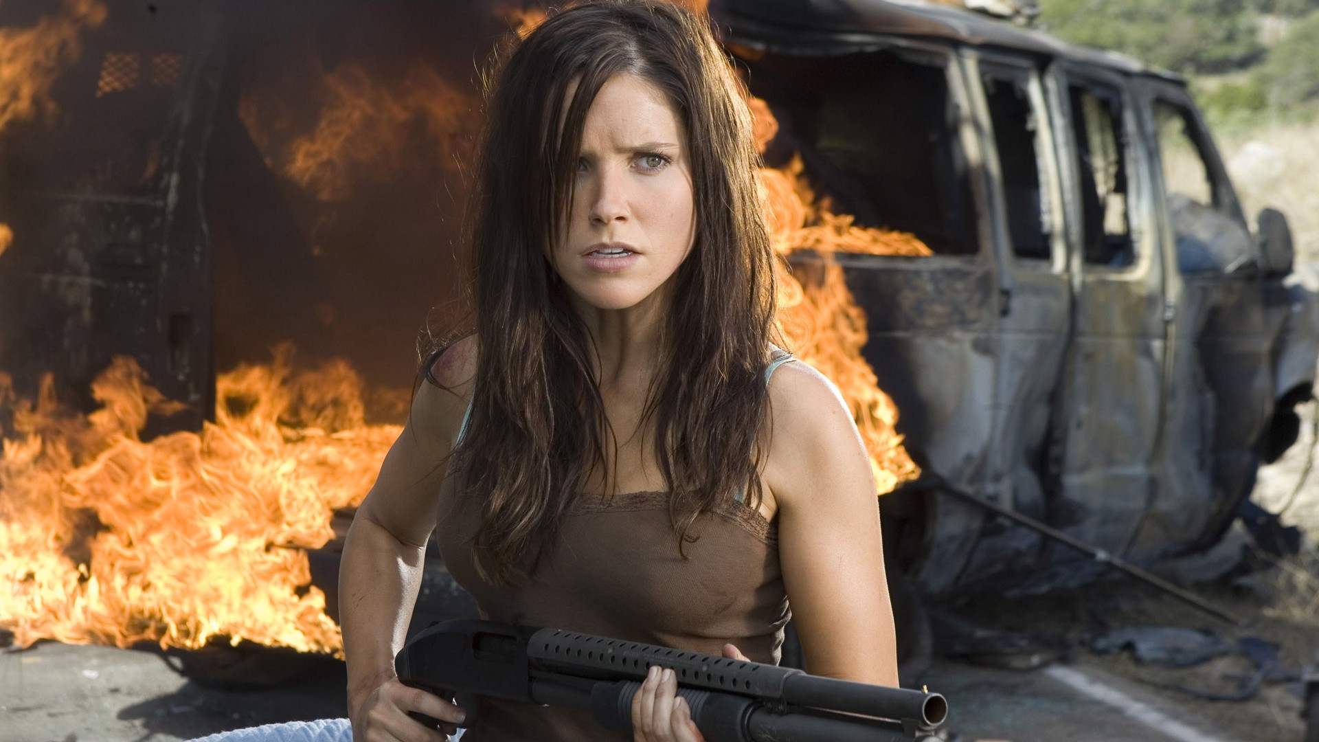 Sophia Bush with Shotgun in Front of Burning Van HD Wallpaper