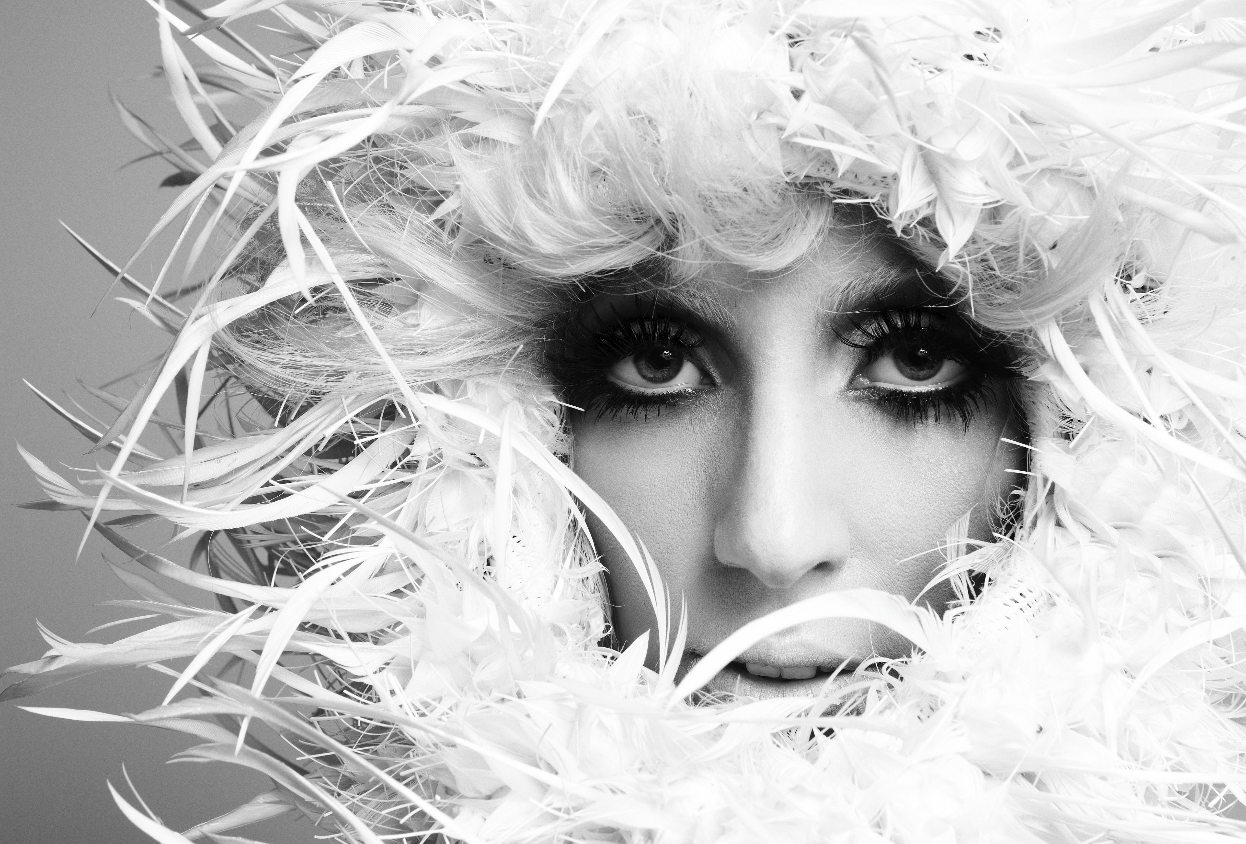 Lady Gaga with white feathers HD Wallpaper