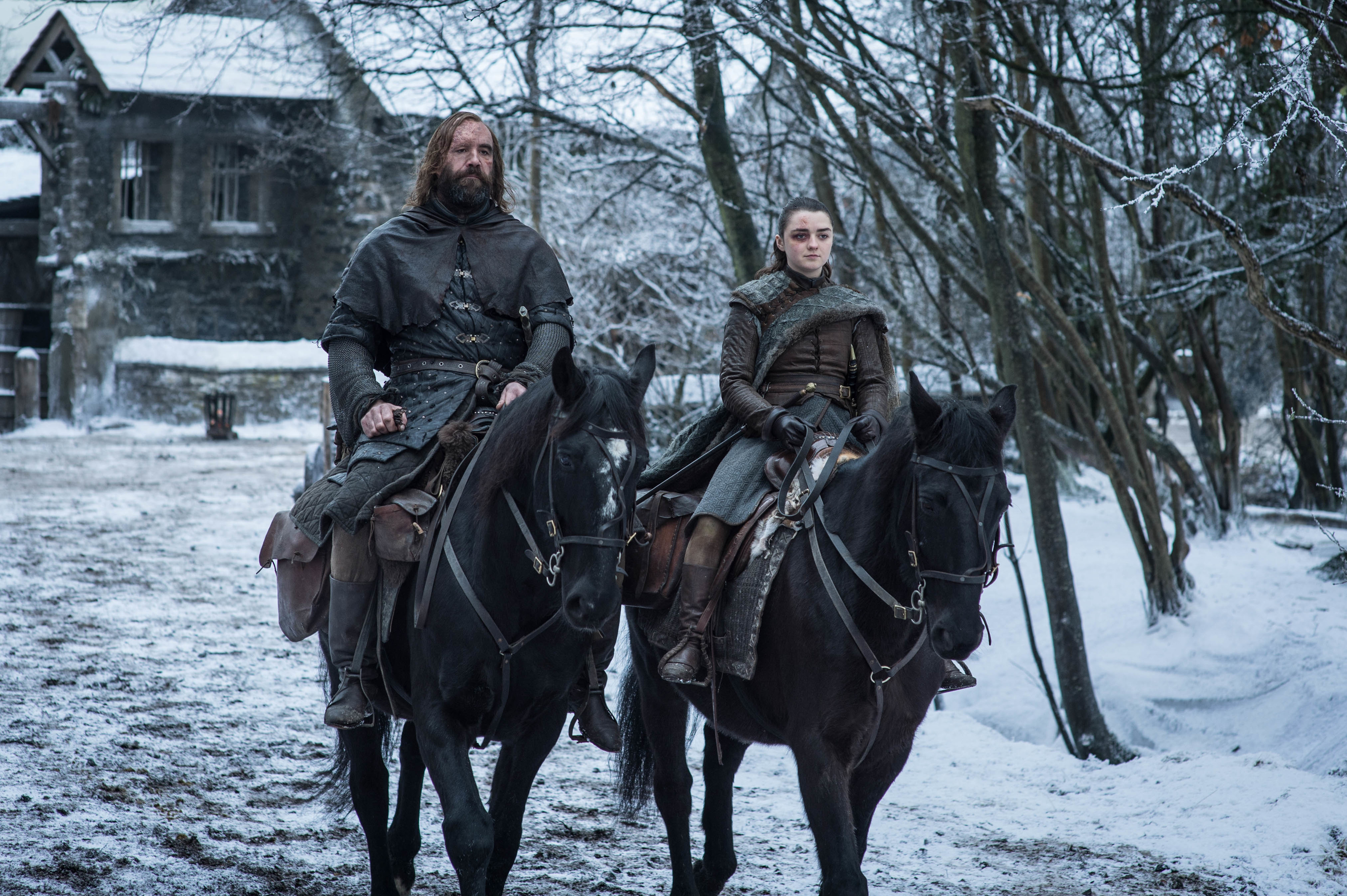 The Hound and Arya Stark on horseback in winter HD Wallpaper