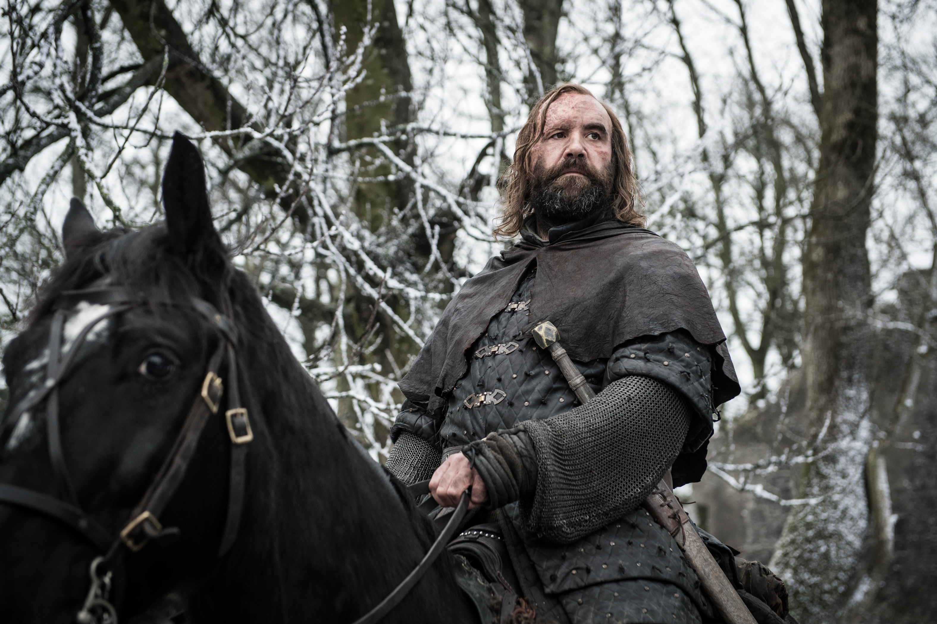 Rory McCann as The Hound on horseback in winter HD Wallpaper