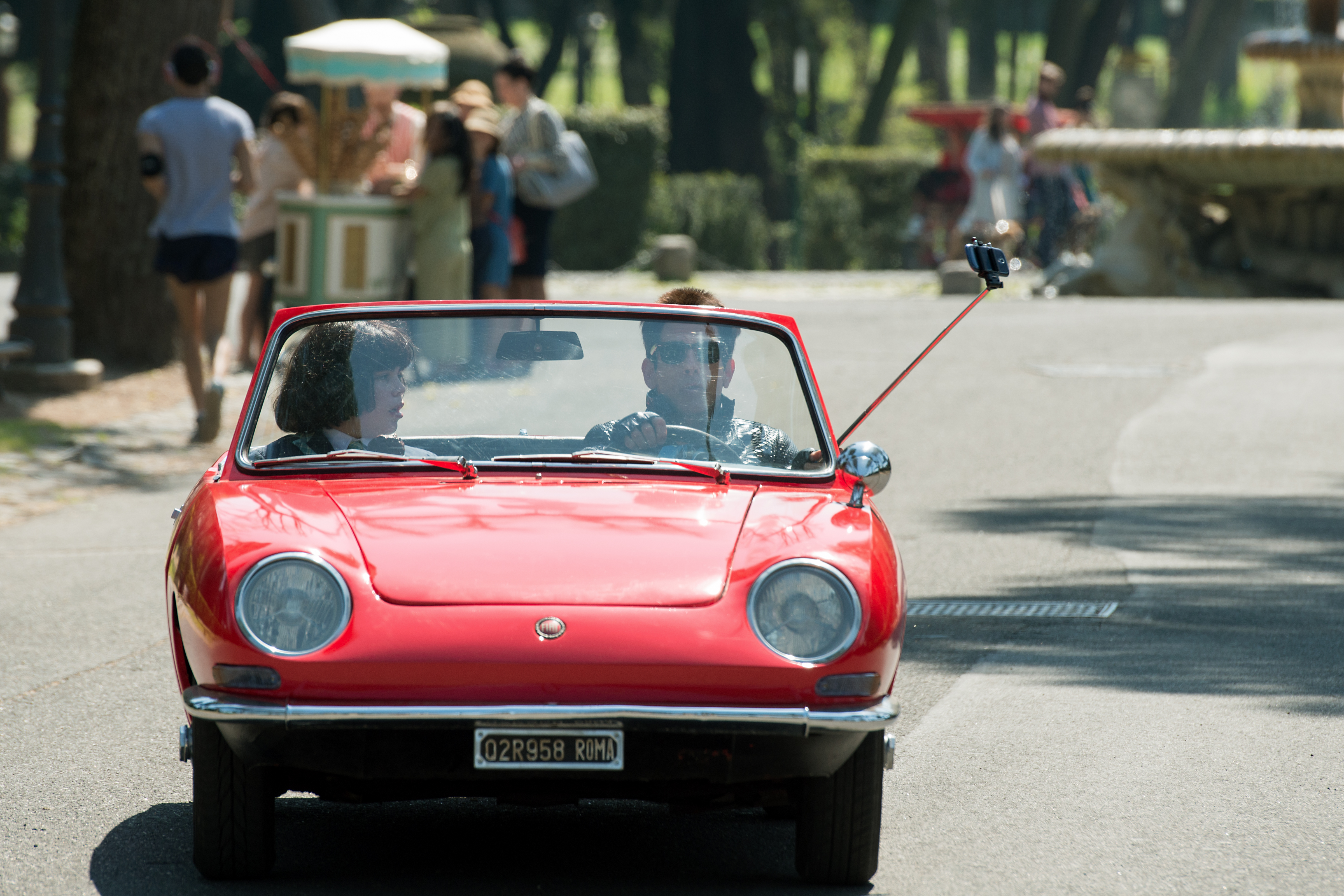 Ben Stiller driving a red Fiat 600 in Rome HD Wallpaper