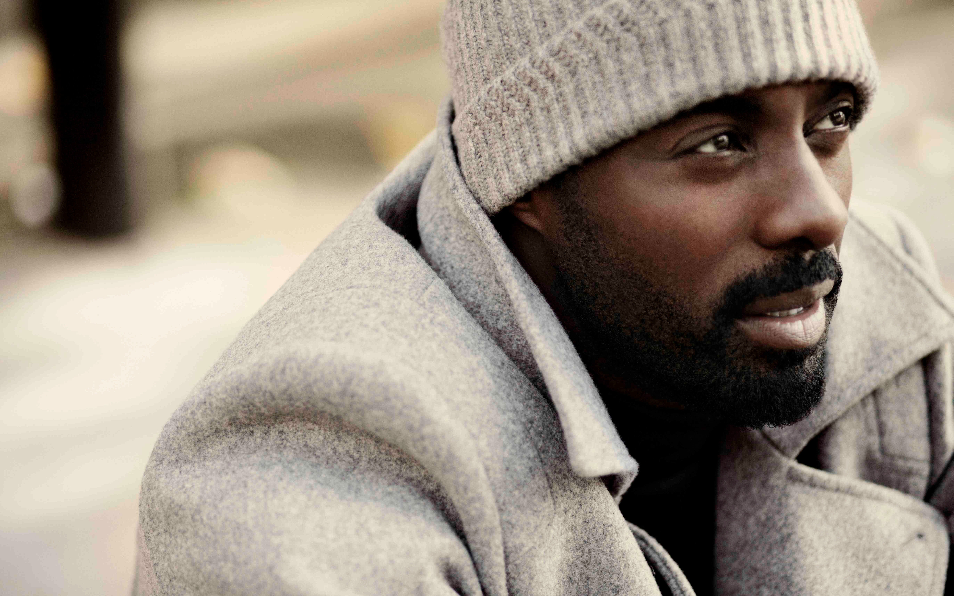 Idris Elba wearing a beanie and coat HD Wallpaper