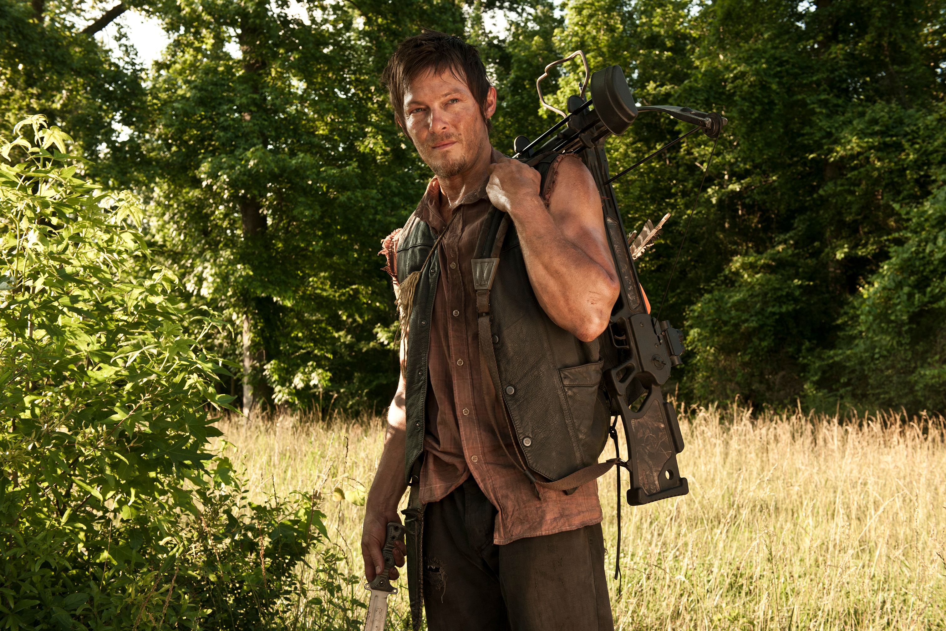 Norman Reedus with crossbow in The Walking Dead HD Wallpaper