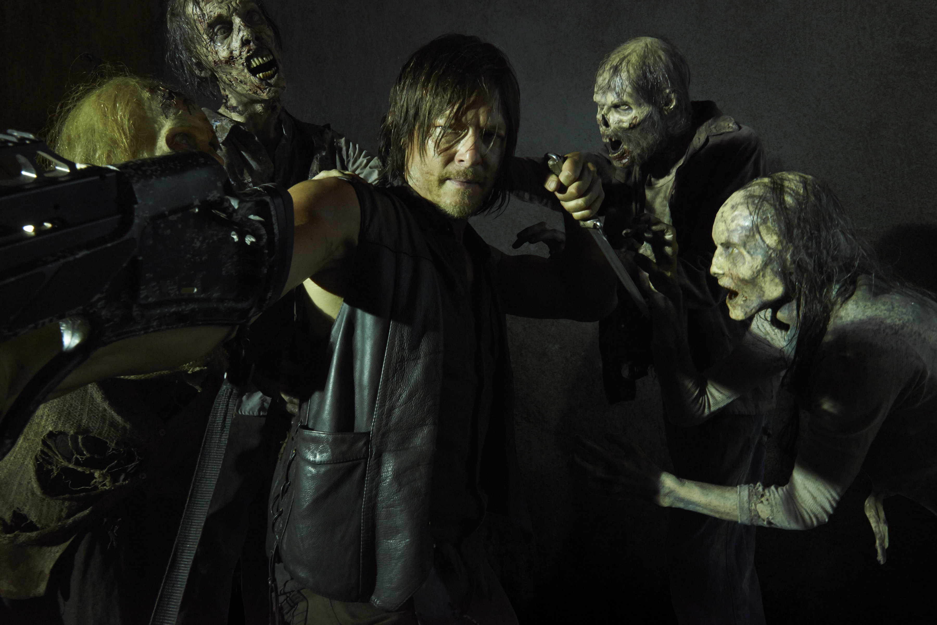 Norman Reedus fighting zombies HD Wallpaper