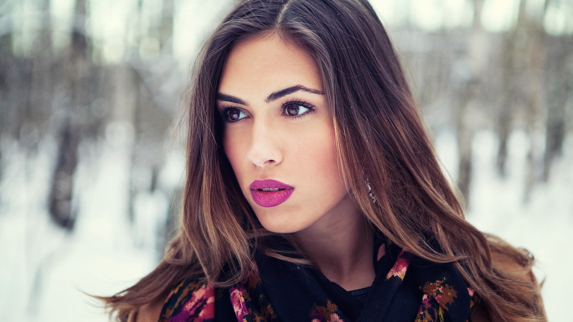Woman with pink lipstick in winter forest HD Wallpaper