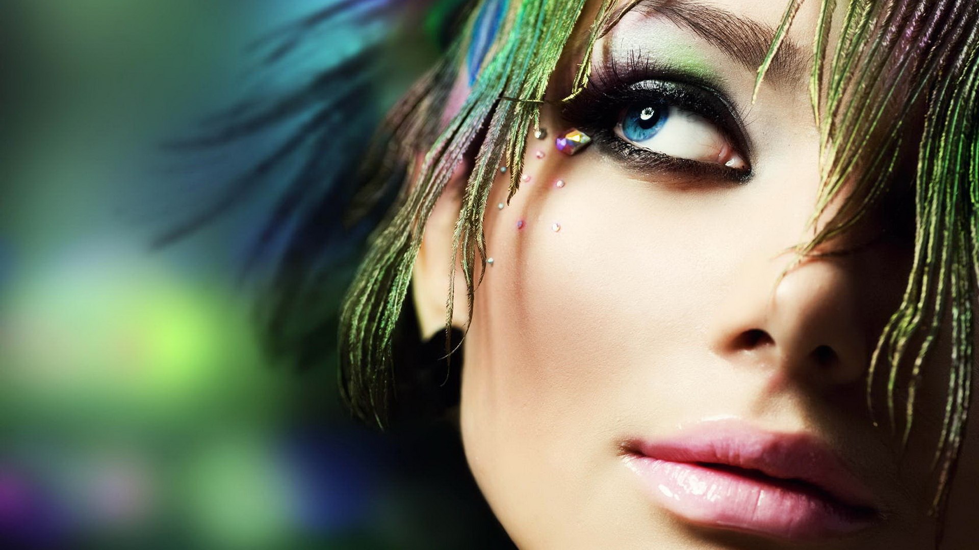 Woman with peacock feathers and face gems HD Wallpaper