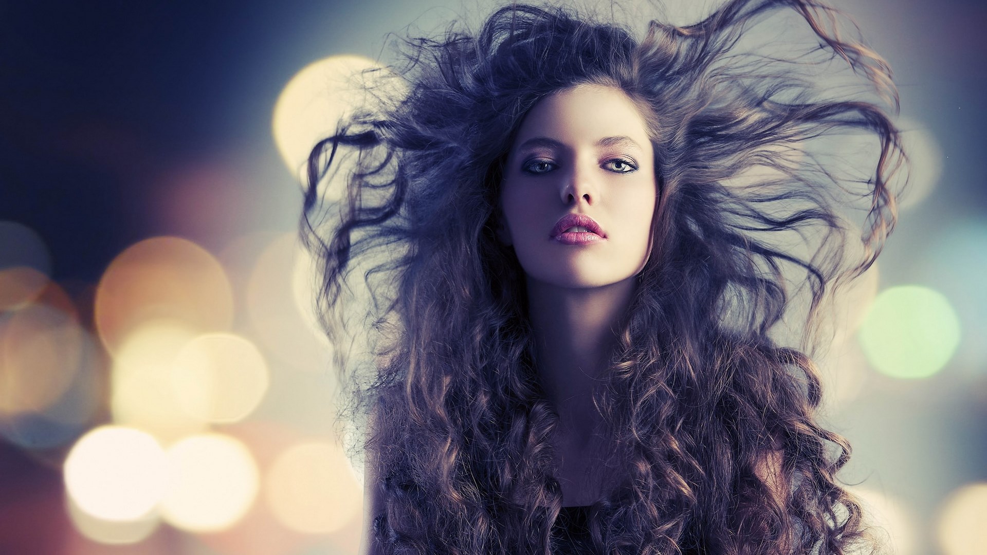 Woman with long curly hair and bokeh lights HD Wallpaper