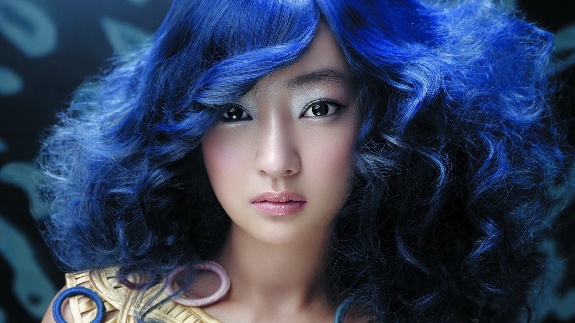 Woman with blue curly hair and makeup HD Wallpaper