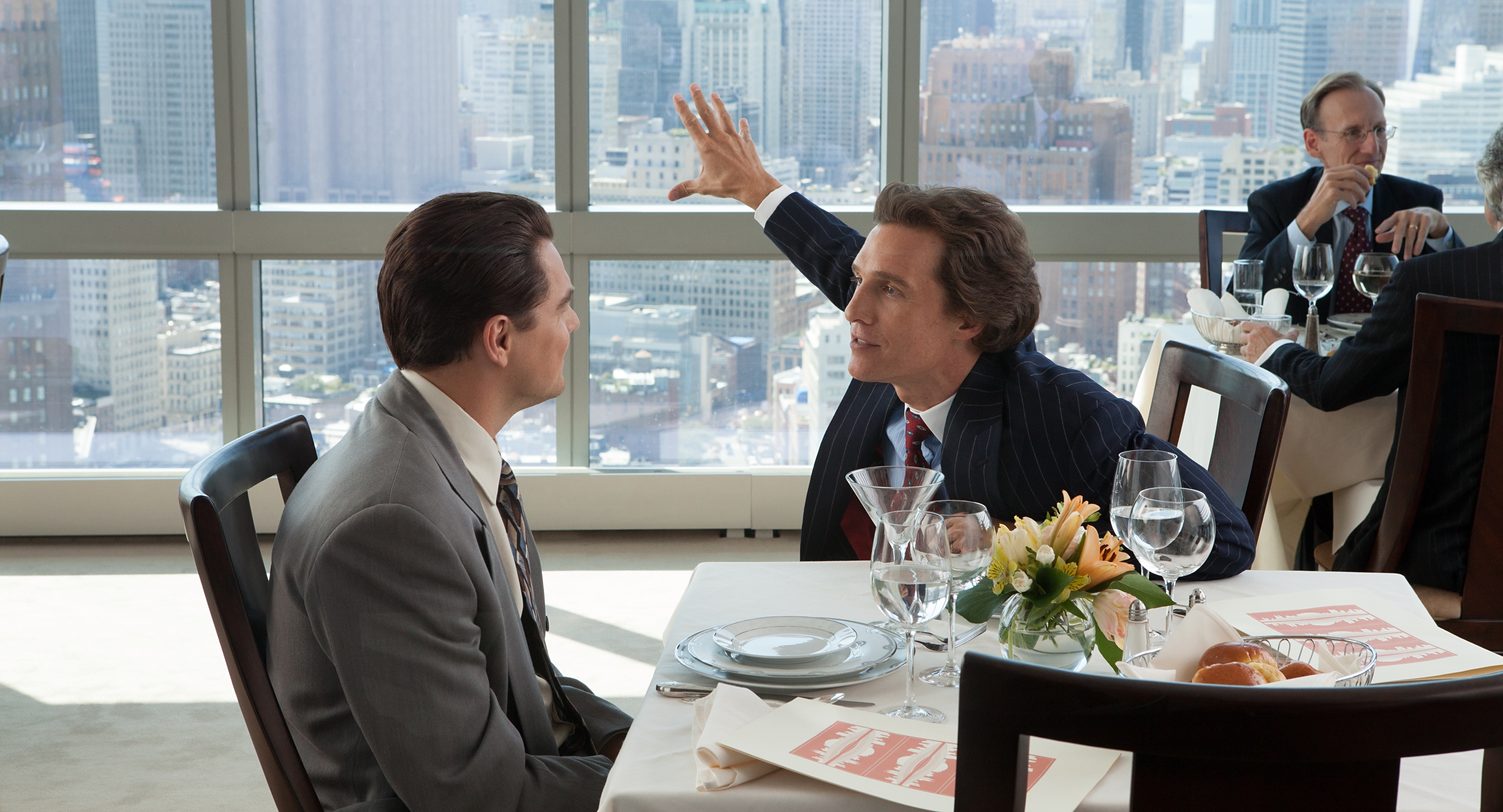 Matthew McConaughey and Leonardo DiCaprio at a business lunch HD Wallpaper