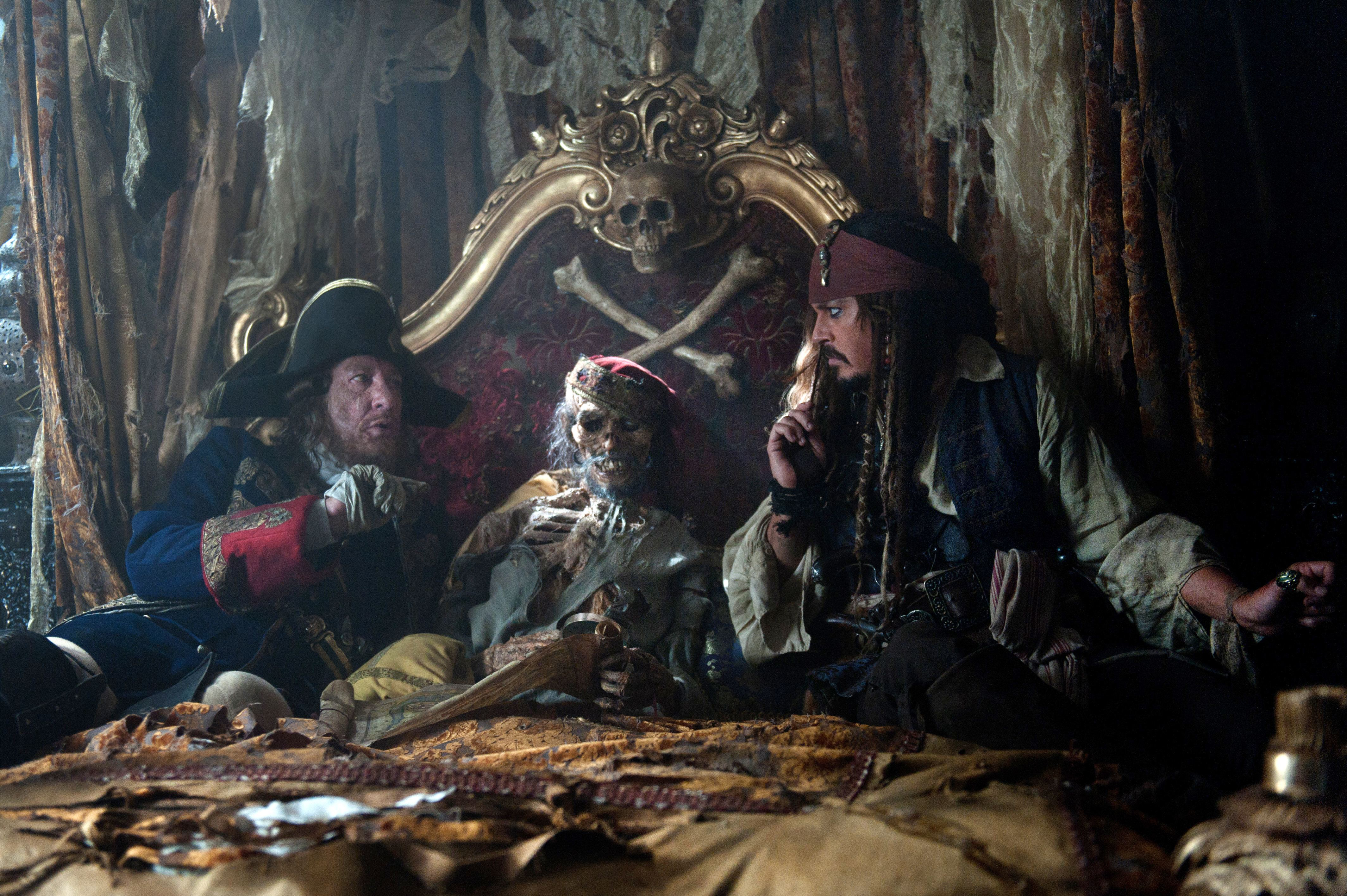 Captain Barbossa and Captain Jack Sparrow with a skeleton HD Wallpaper