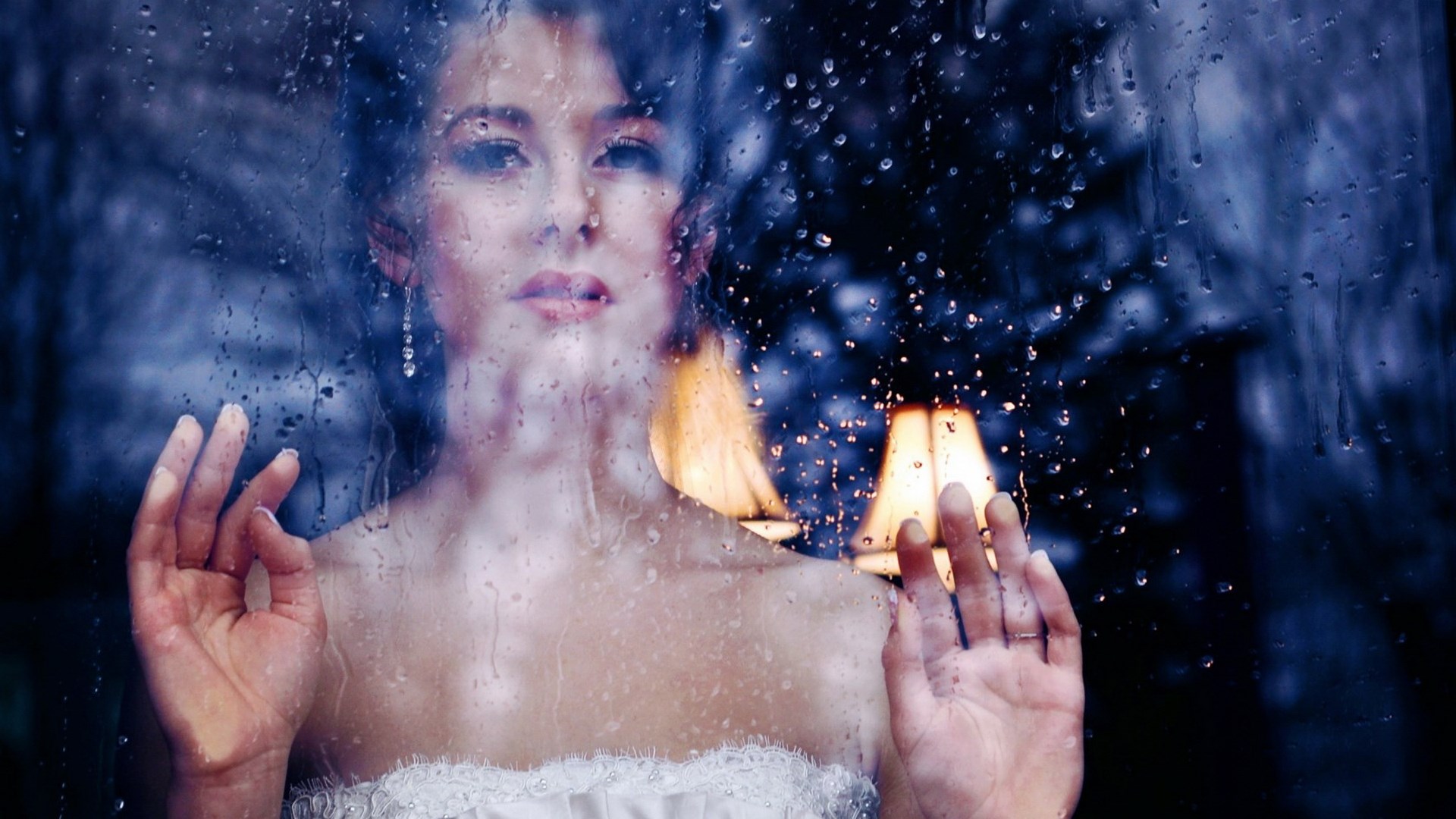 Bride looking through a rainy window HD Wallpaper