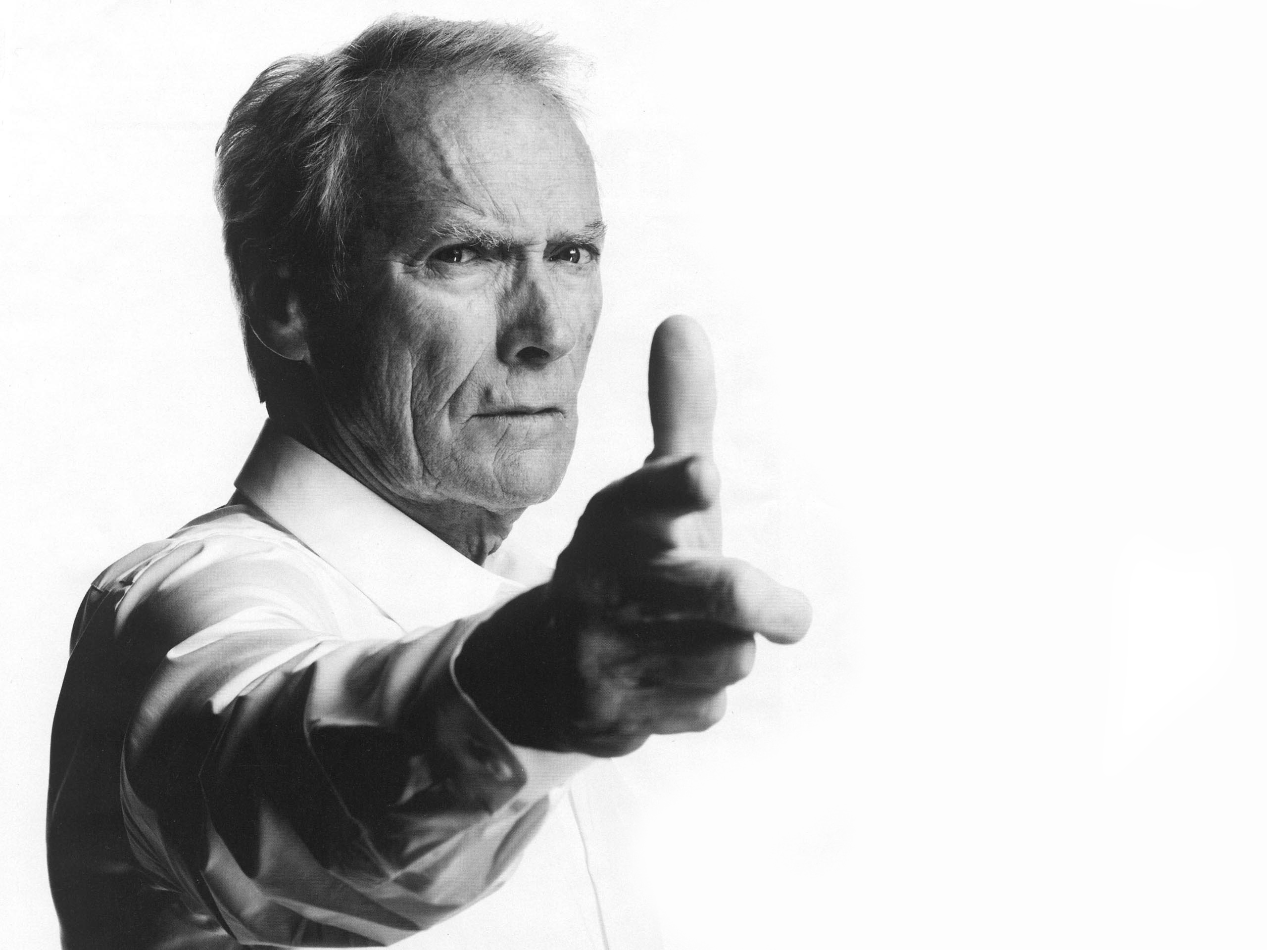 Clint Eastwood pointing finger gun HD Wallpaper