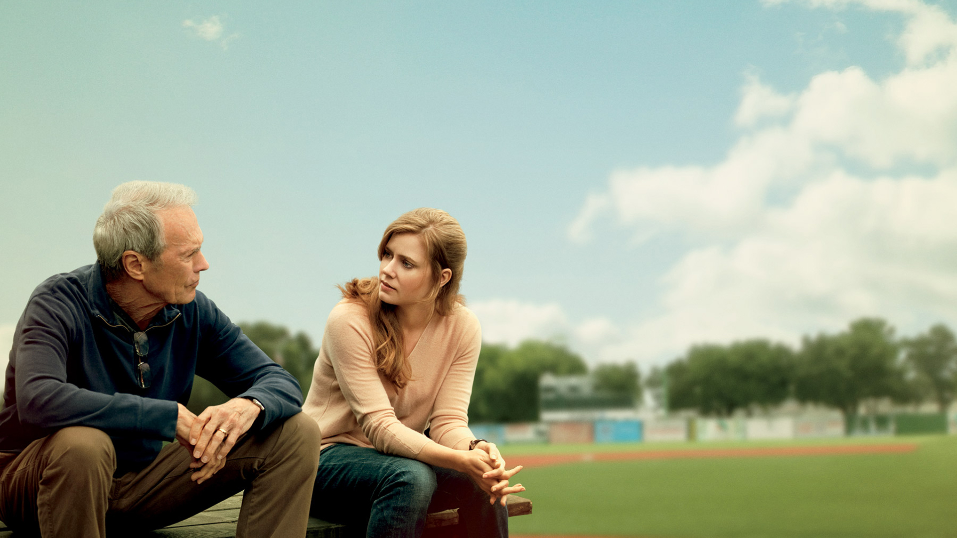 Clint Eastwood and Amy Adams sitting outdoors HD Wallpaper