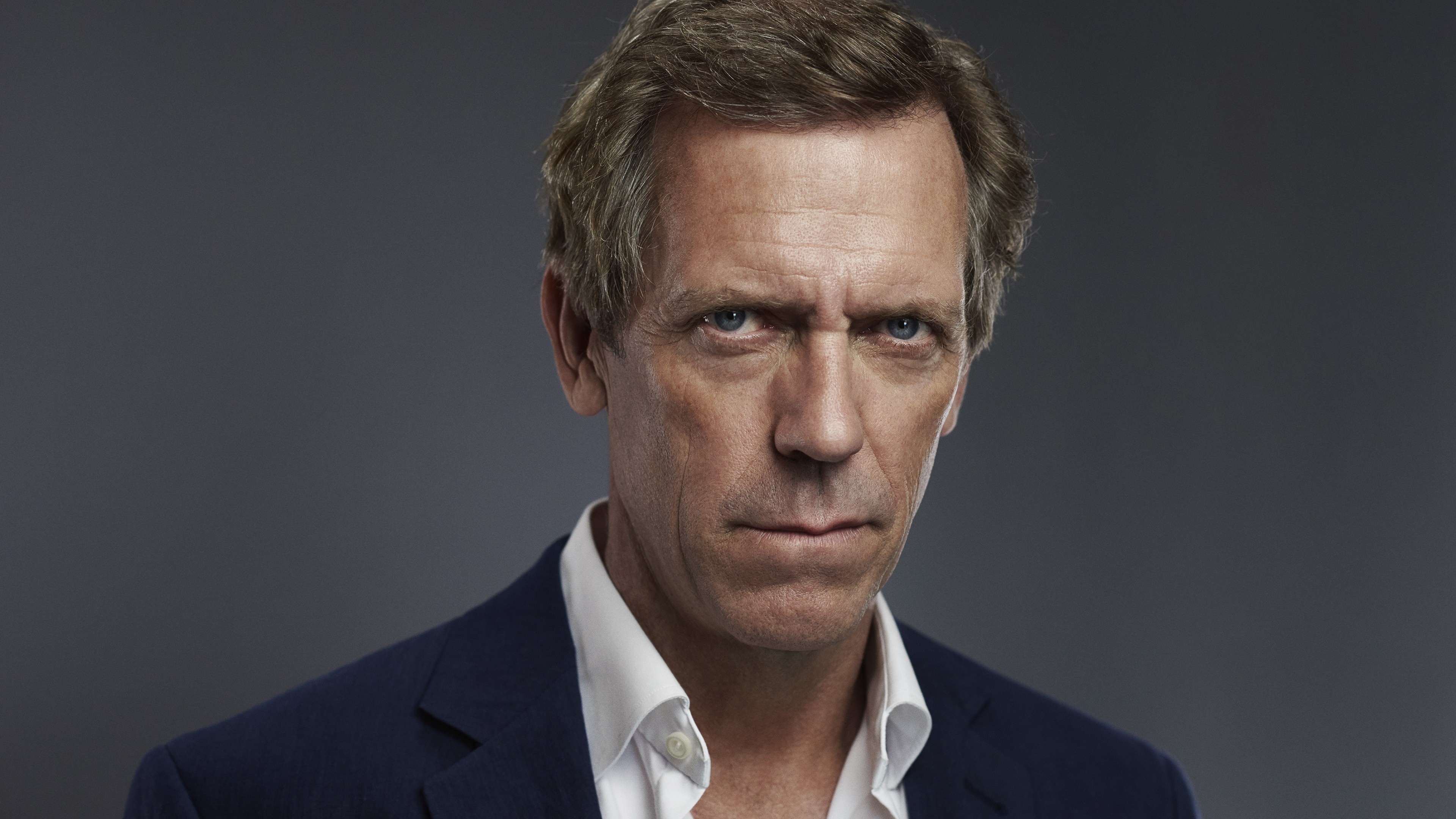 Hugh Laurie in a suit HD Wallpaper