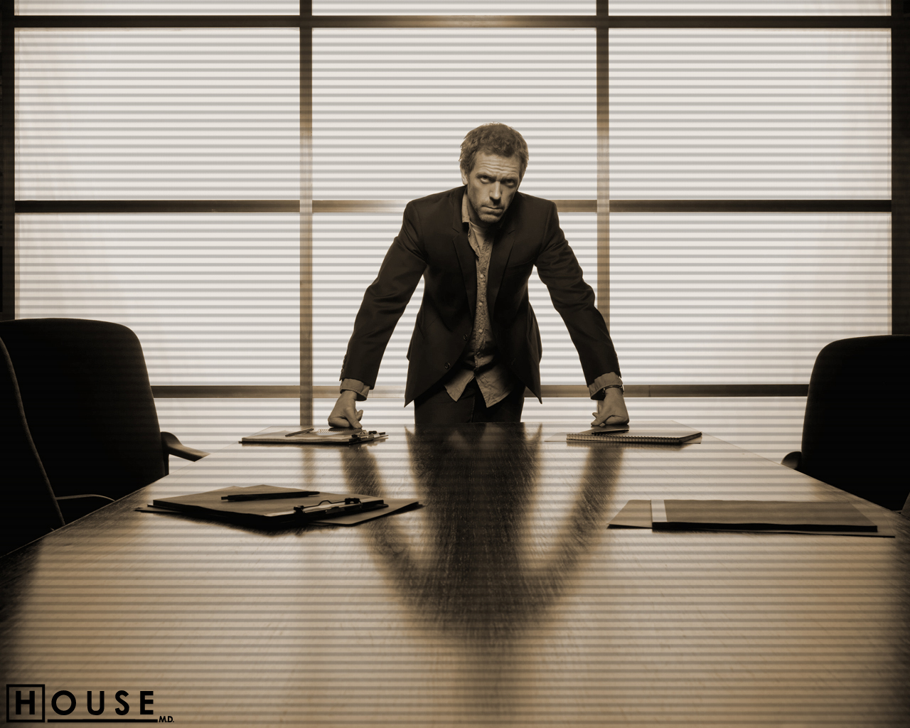 Hugh Laurie as Dr. House in a boardroom HD Wallpaper