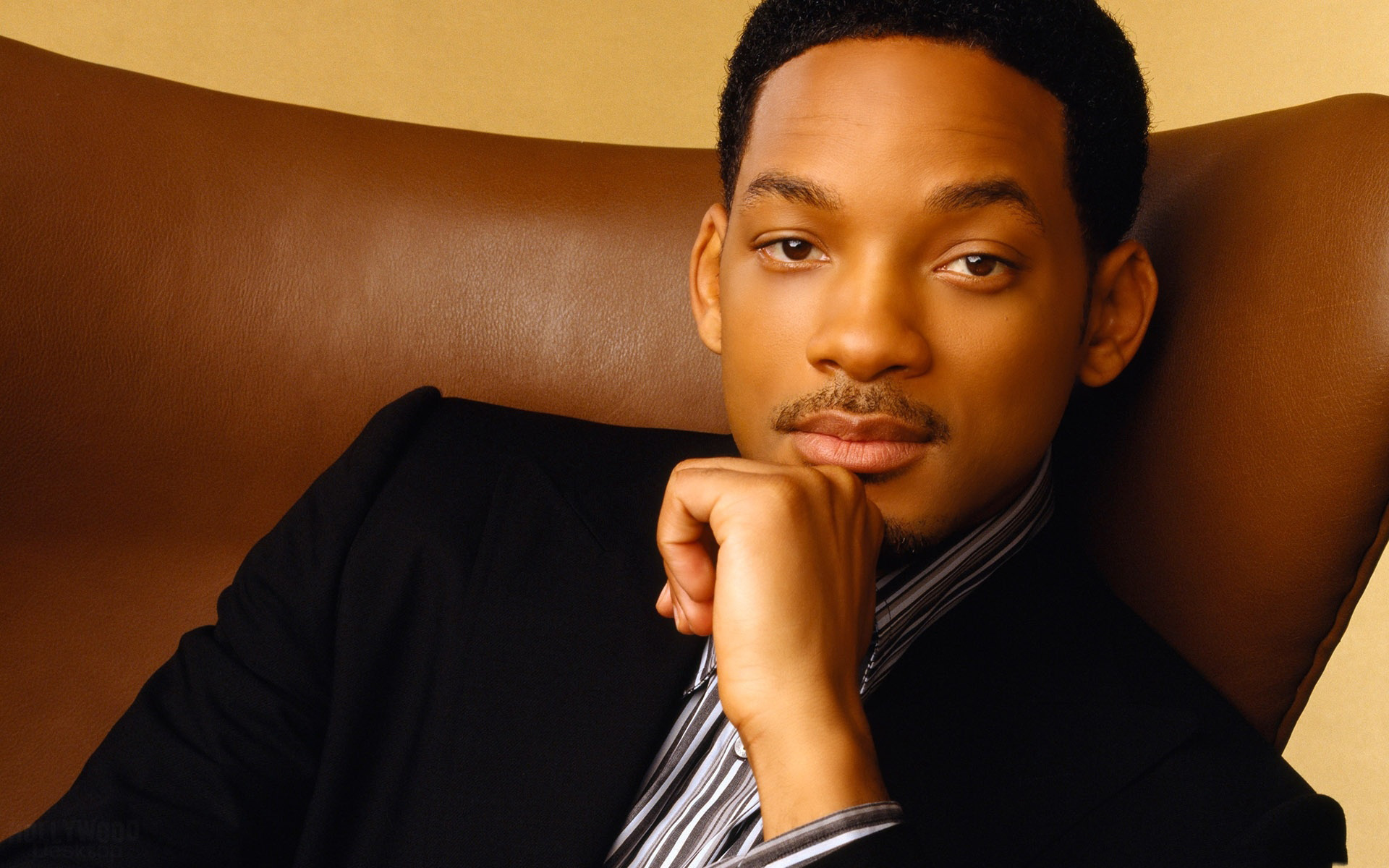 Will Smith sitting in a chair HD Wallpaper