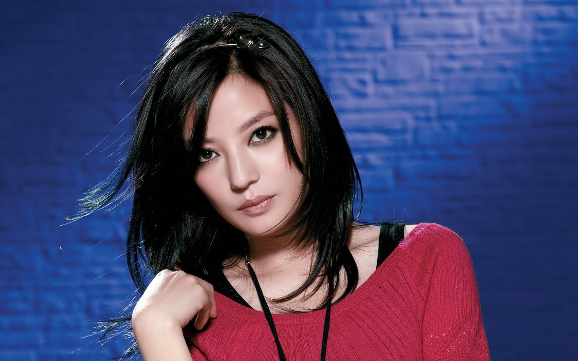 Woman with black hair wearing a red sweater HD Wallpaper