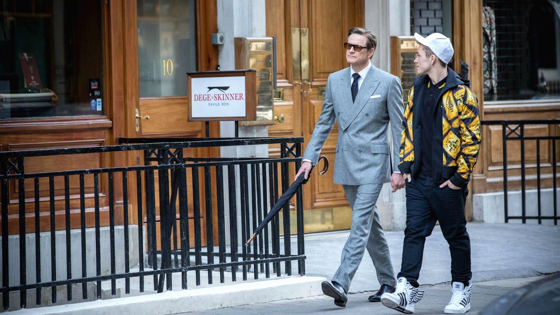Colin Firth and Taron Egerton walking HD Wallpaper