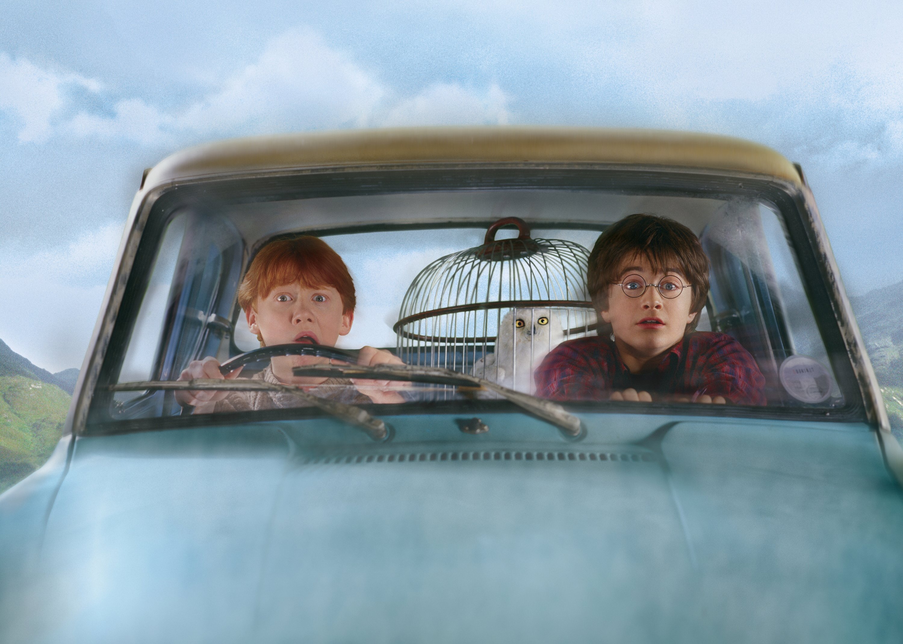 Harry Potter and Ron Weasley in the Flying Ford Anglia HD Wallpaper