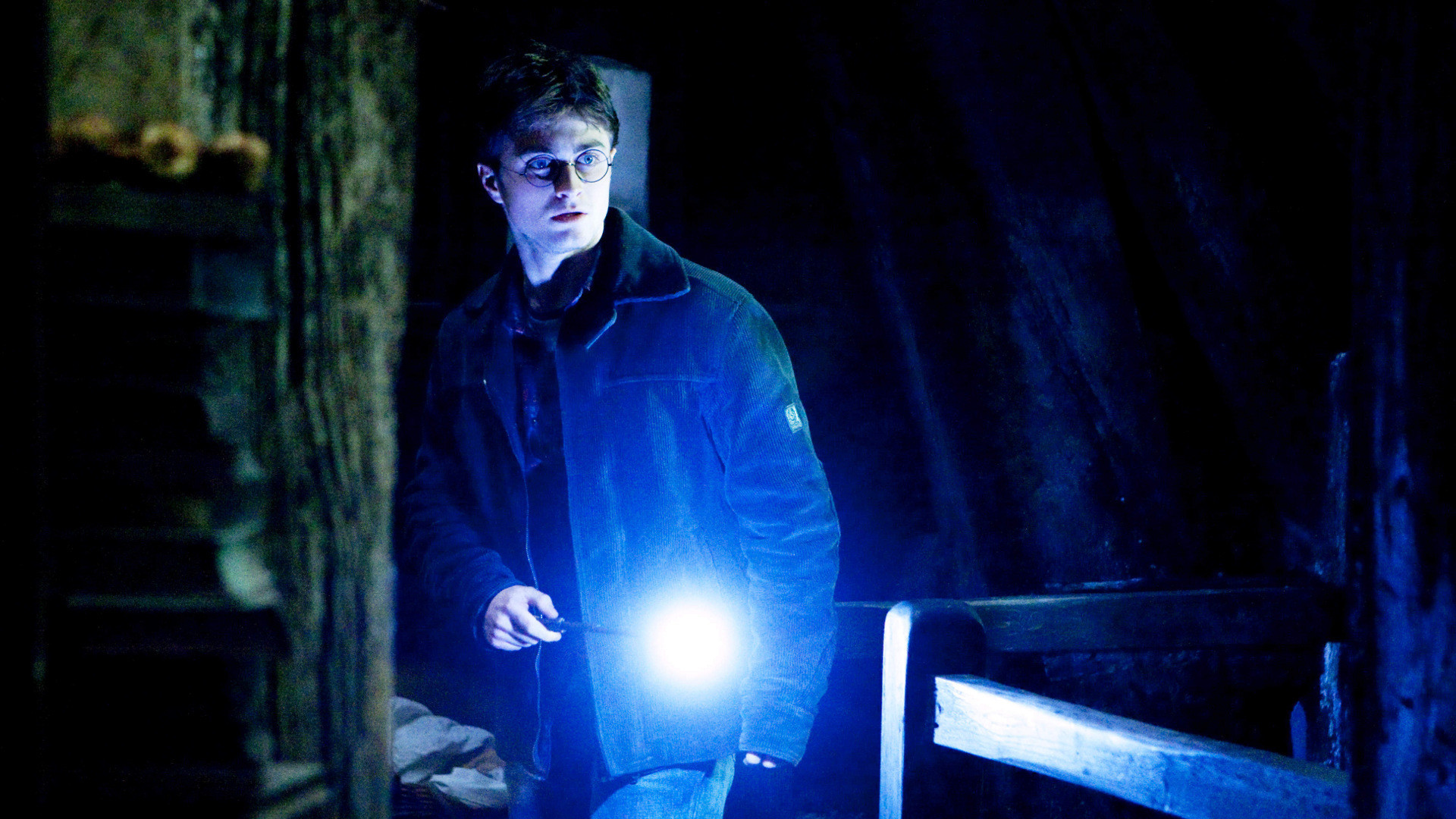 Daniel Radcliffe as Harry Potter holding a wand HD Wallpaper