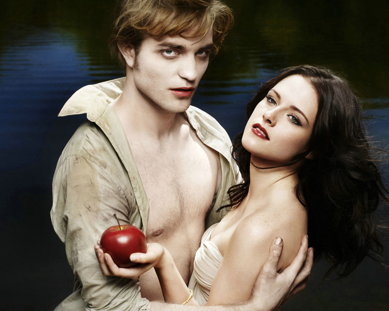 Robert Pattinson and Kristen Stewart with an apple HD Wallpaper