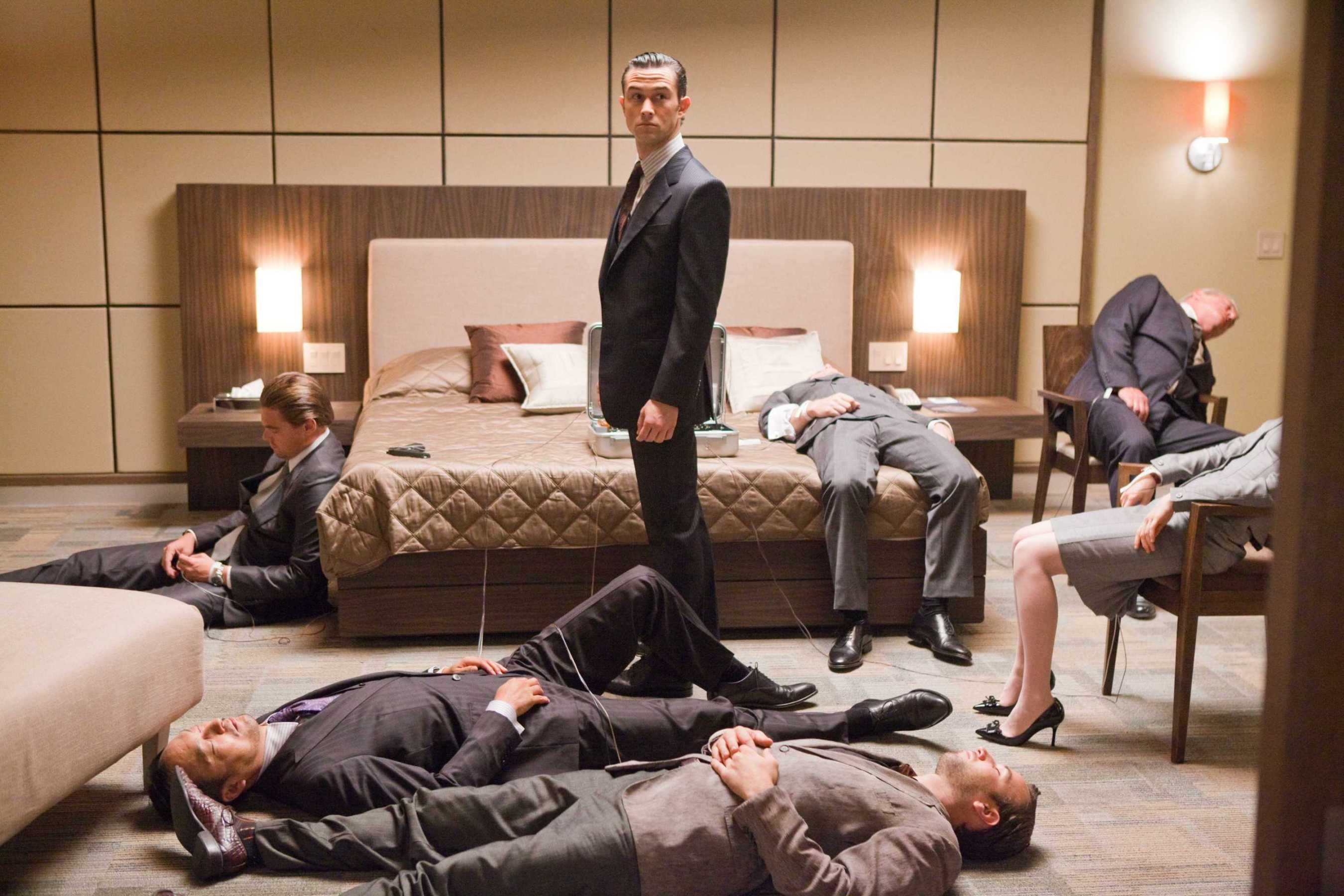 Joseph Gordon-Levitt in a hotel room with unconscious people HD Wallpaper