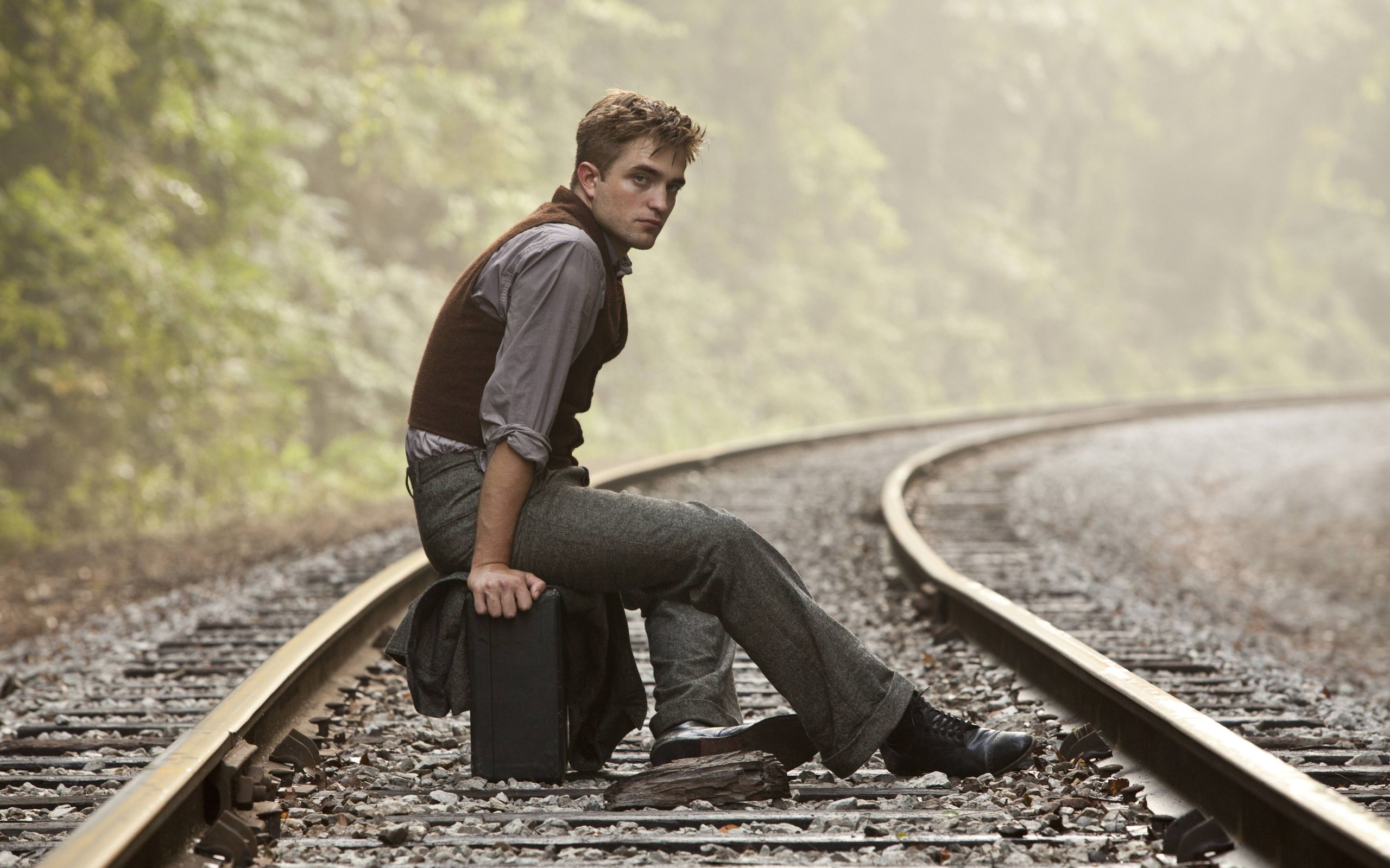 Robert Pattinson on Train Tracks HD Wallpaper