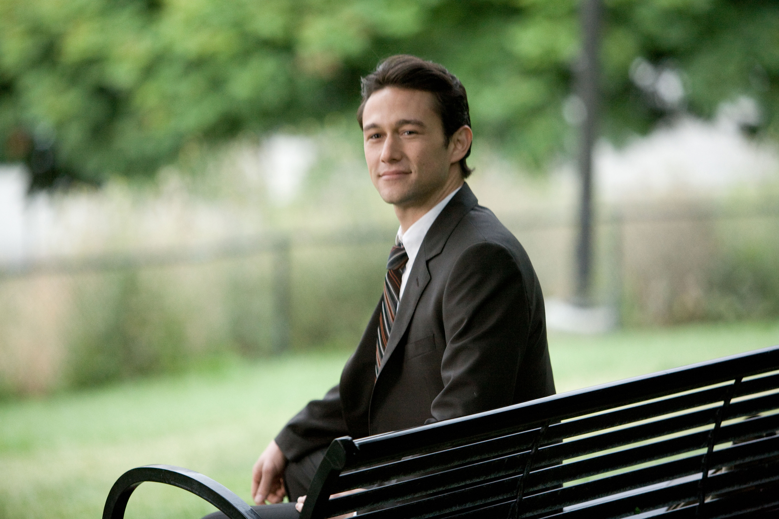 Joseph Gordon-Levitt sitting on a park bench HD Wallpaper