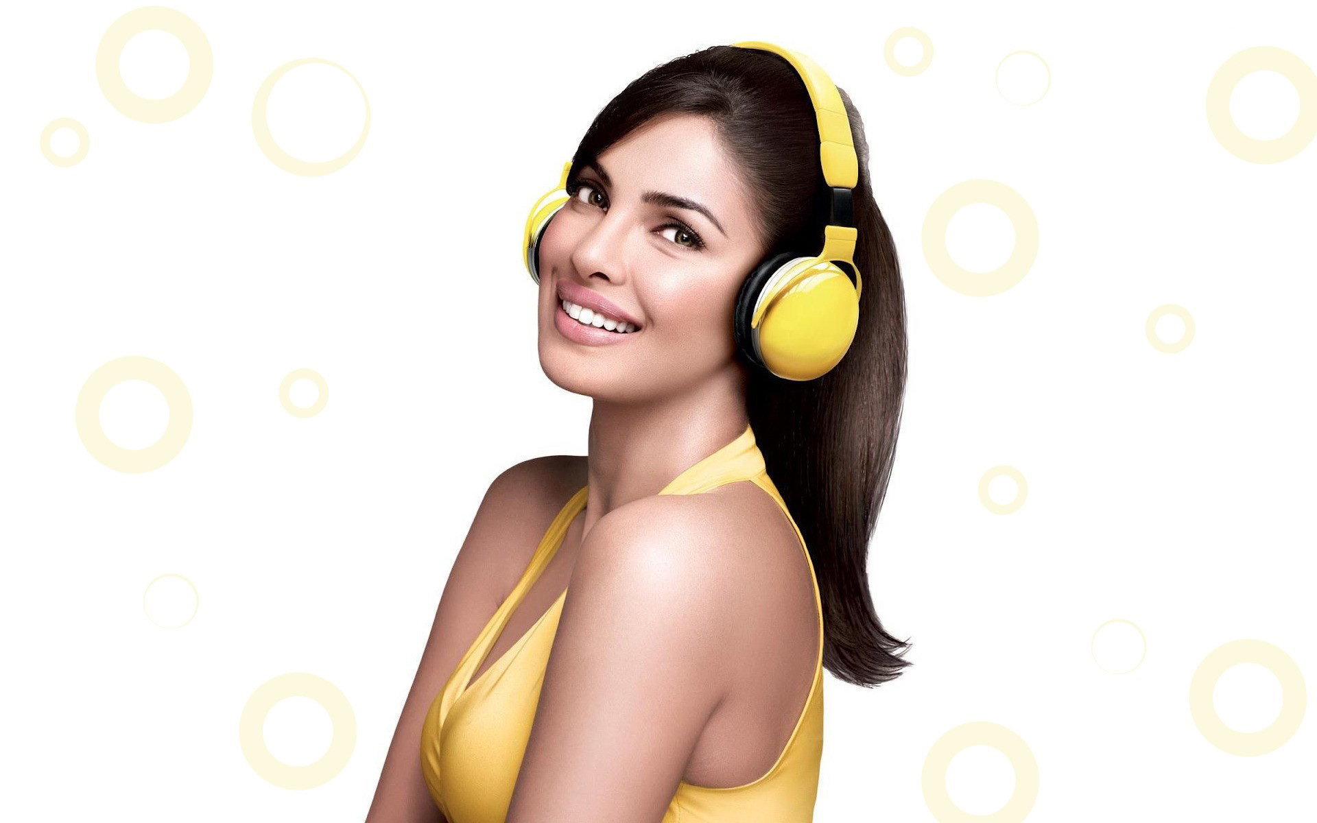Priyanka Chopra wearing yellow headphones HD Wallpaper