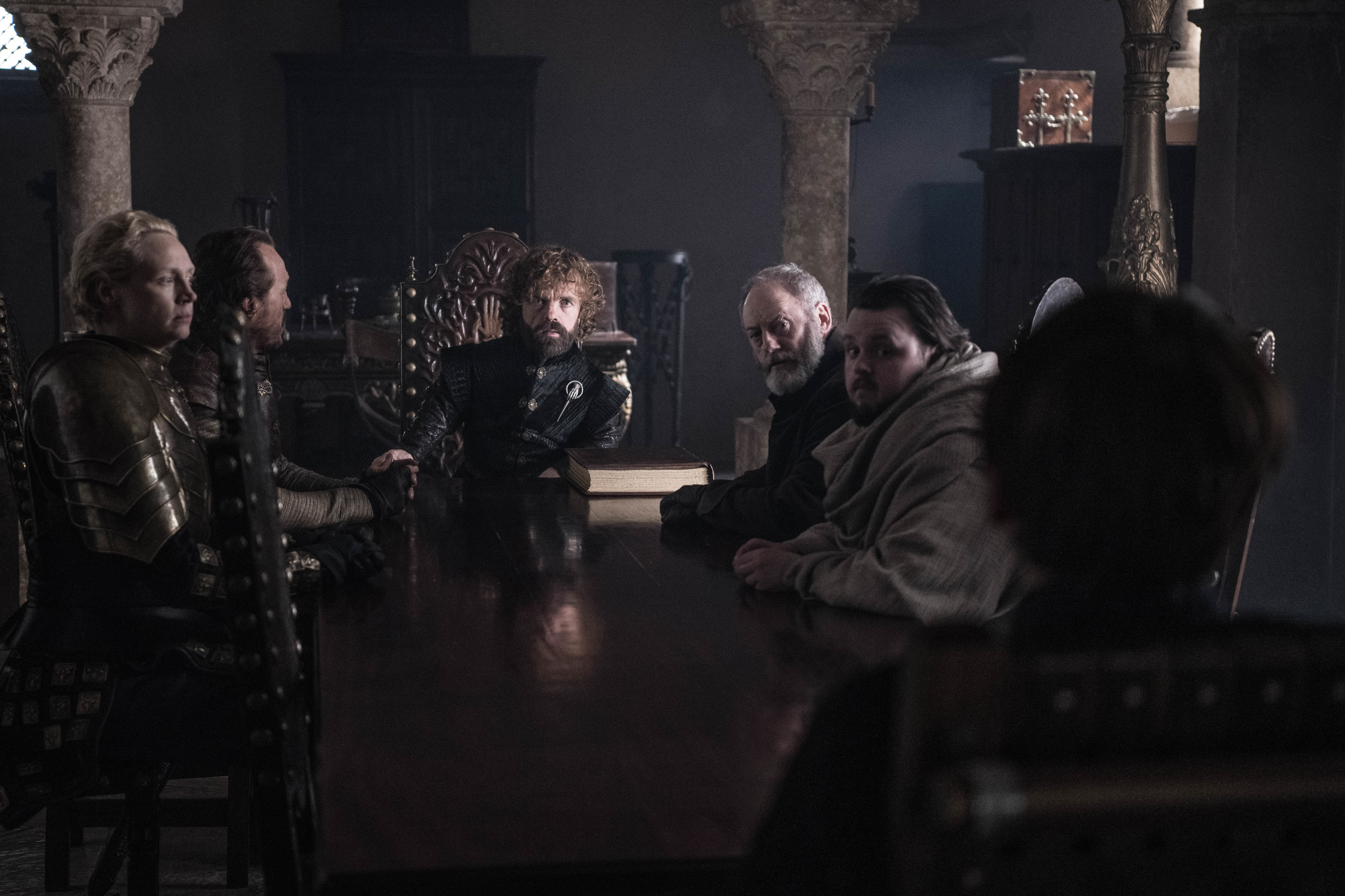Game of Thrones: Tyrion Lannister, Davos Seaworth, and others at a table HD Wallpaper