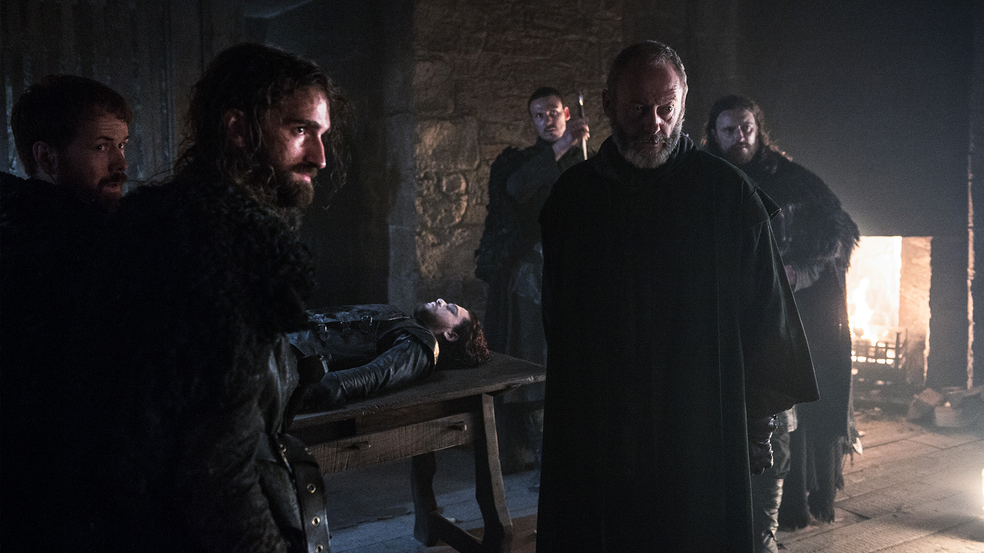 Liam Cunningham and others in a dark room HD Wallpaper
