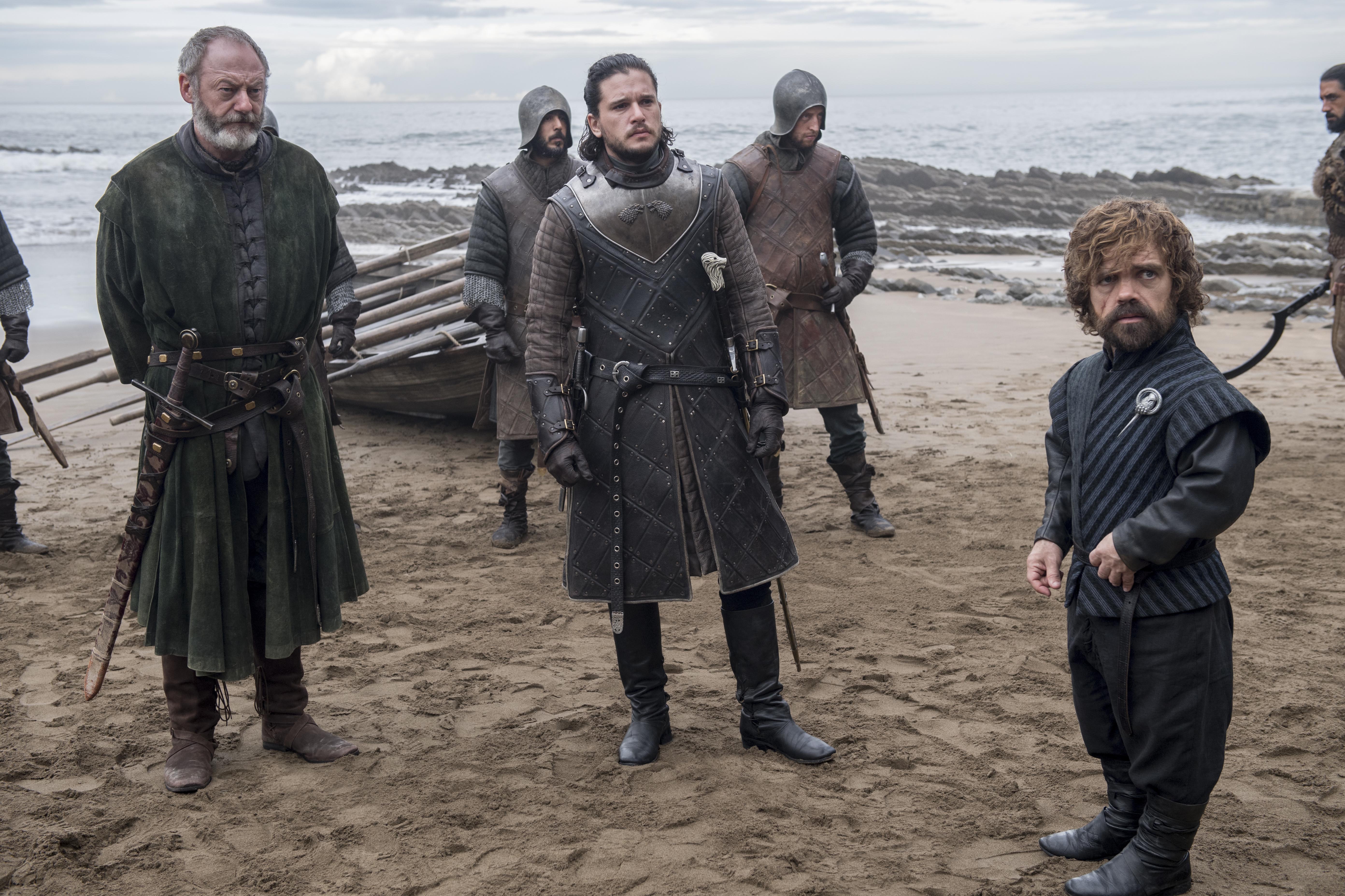 Davos Seaworth, Jon Snow, and Tyrion Lannister on a beach HD Wallpaper