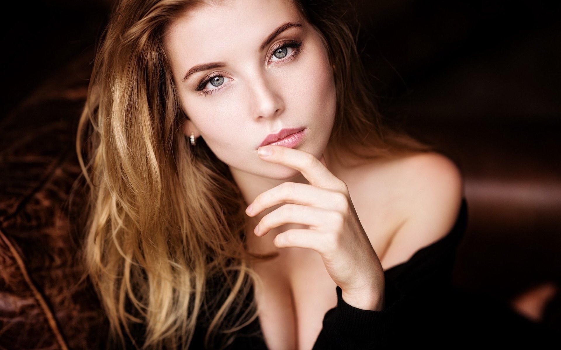Woman with blonde hair touching her lips HD Wallpaper