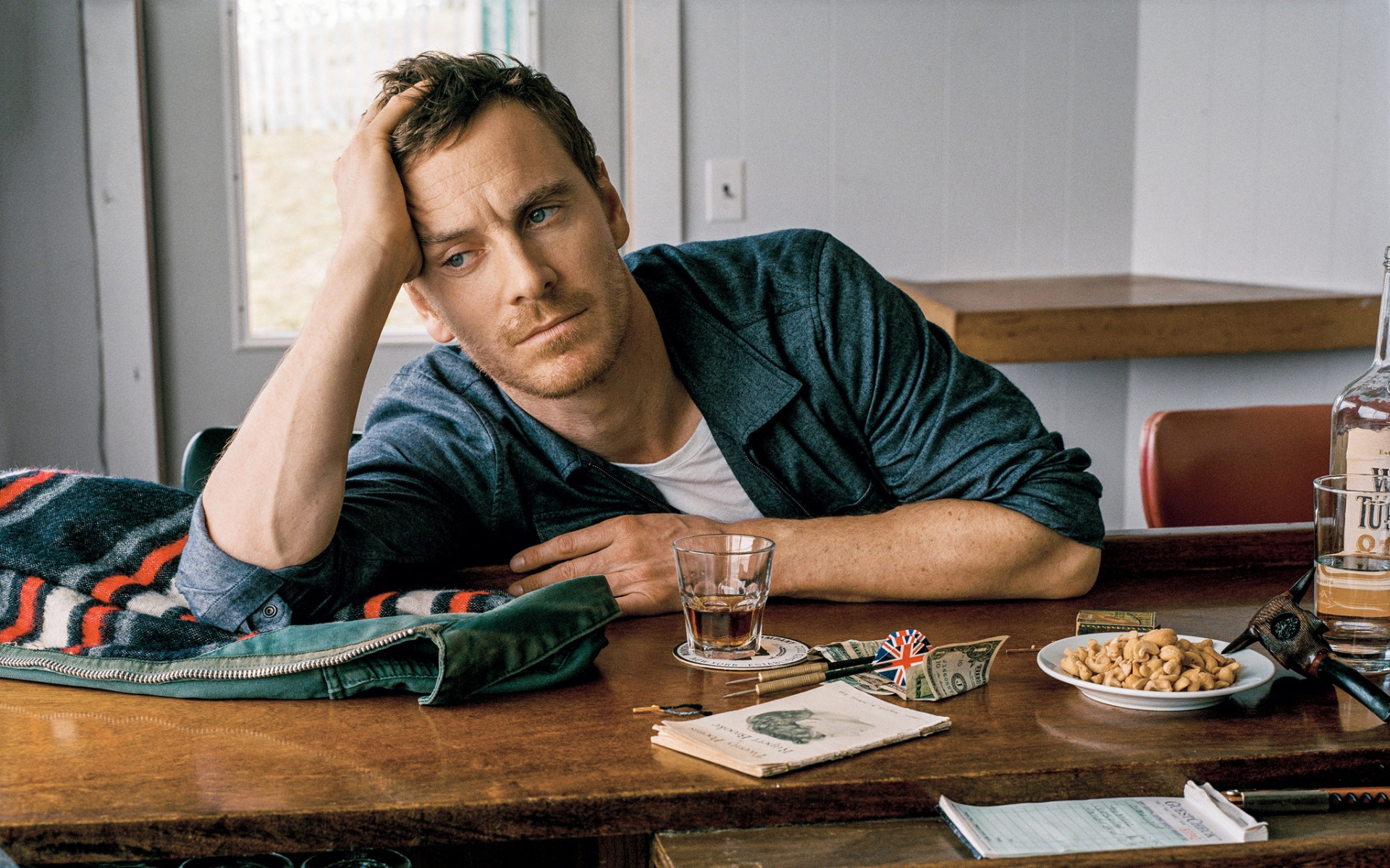 Michael Fassbender sitting at a bar HD Wallpaper