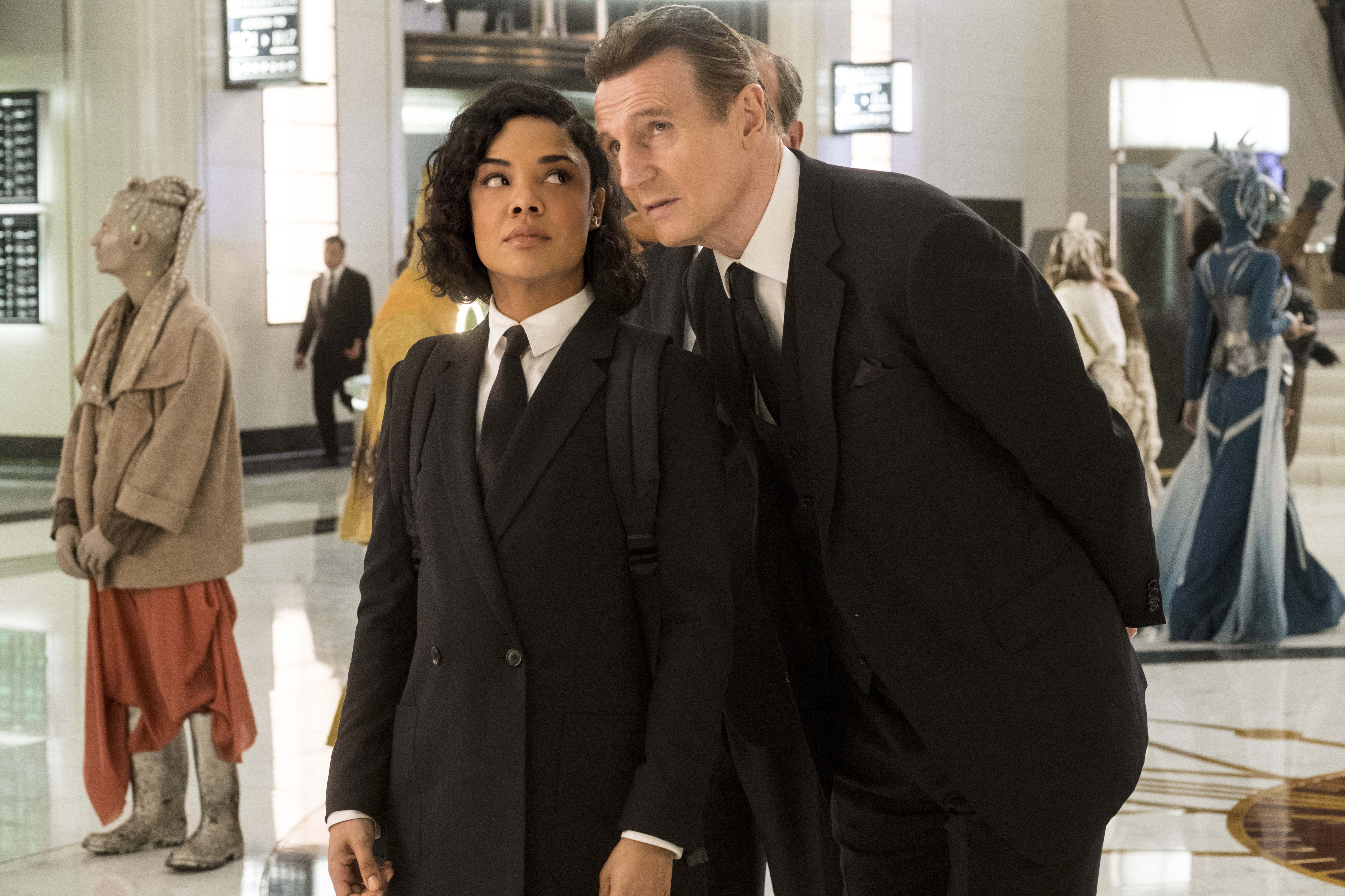 Liam Neeson and Tessa Thompson in Men in Black: International HD Wallpaper