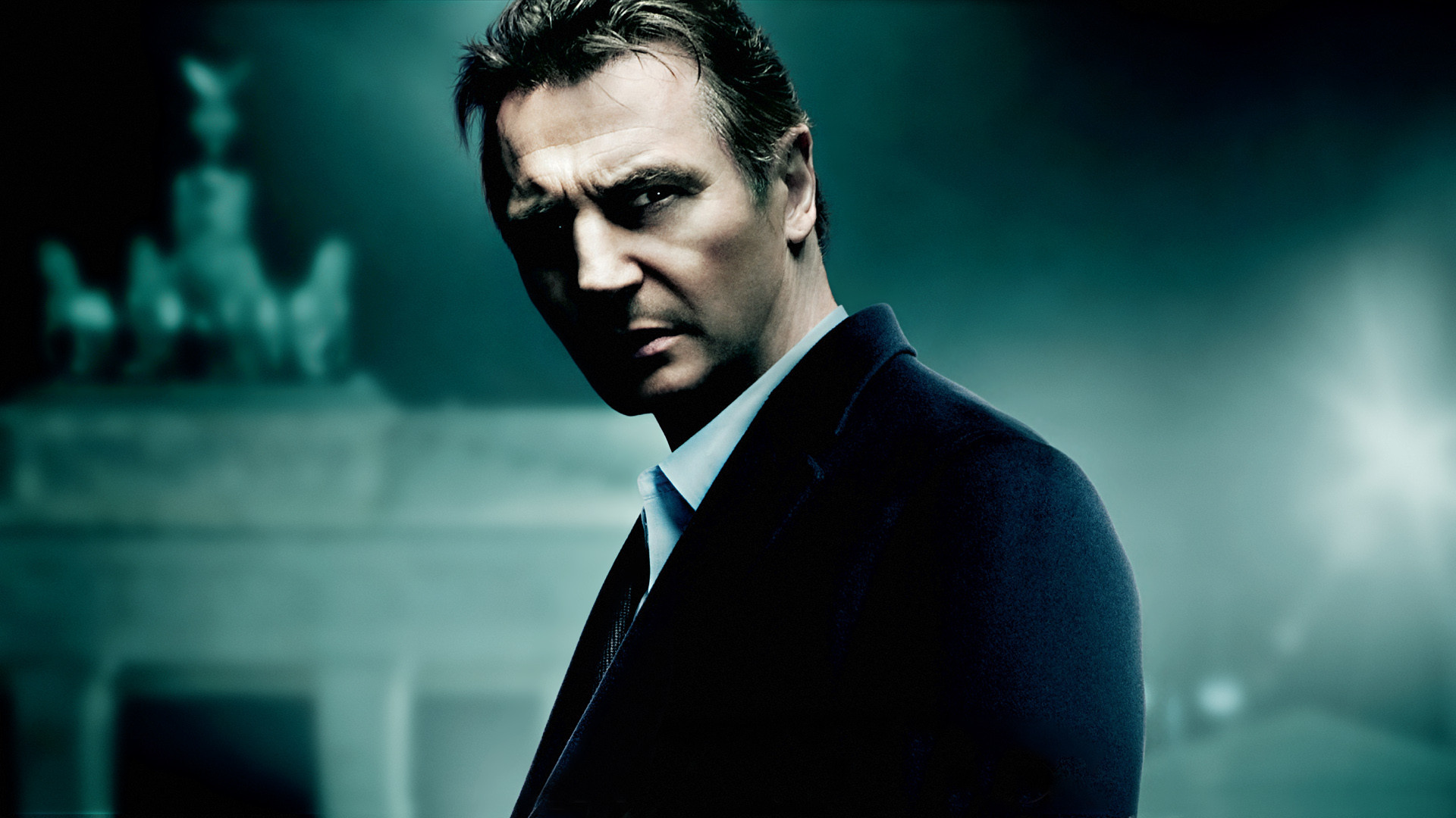 Liam Neeson in a dark suit HD Wallpaper